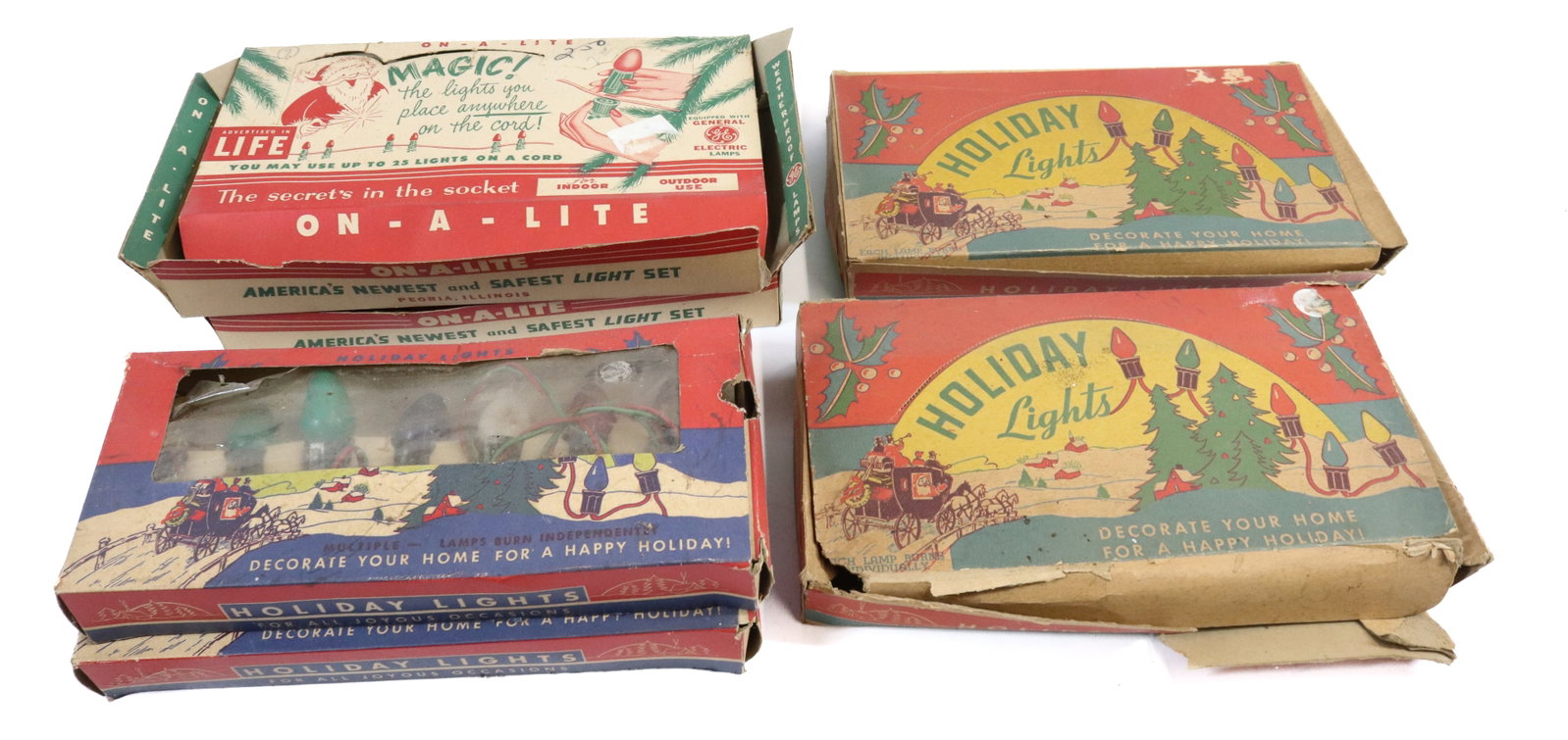LOT OF VINTAGE CHRISTMAS LIGHTS IN BOXES: FOUR HOLIDAY LIGHTS AND TWO ON-A-LITE BRAND. 11" L.