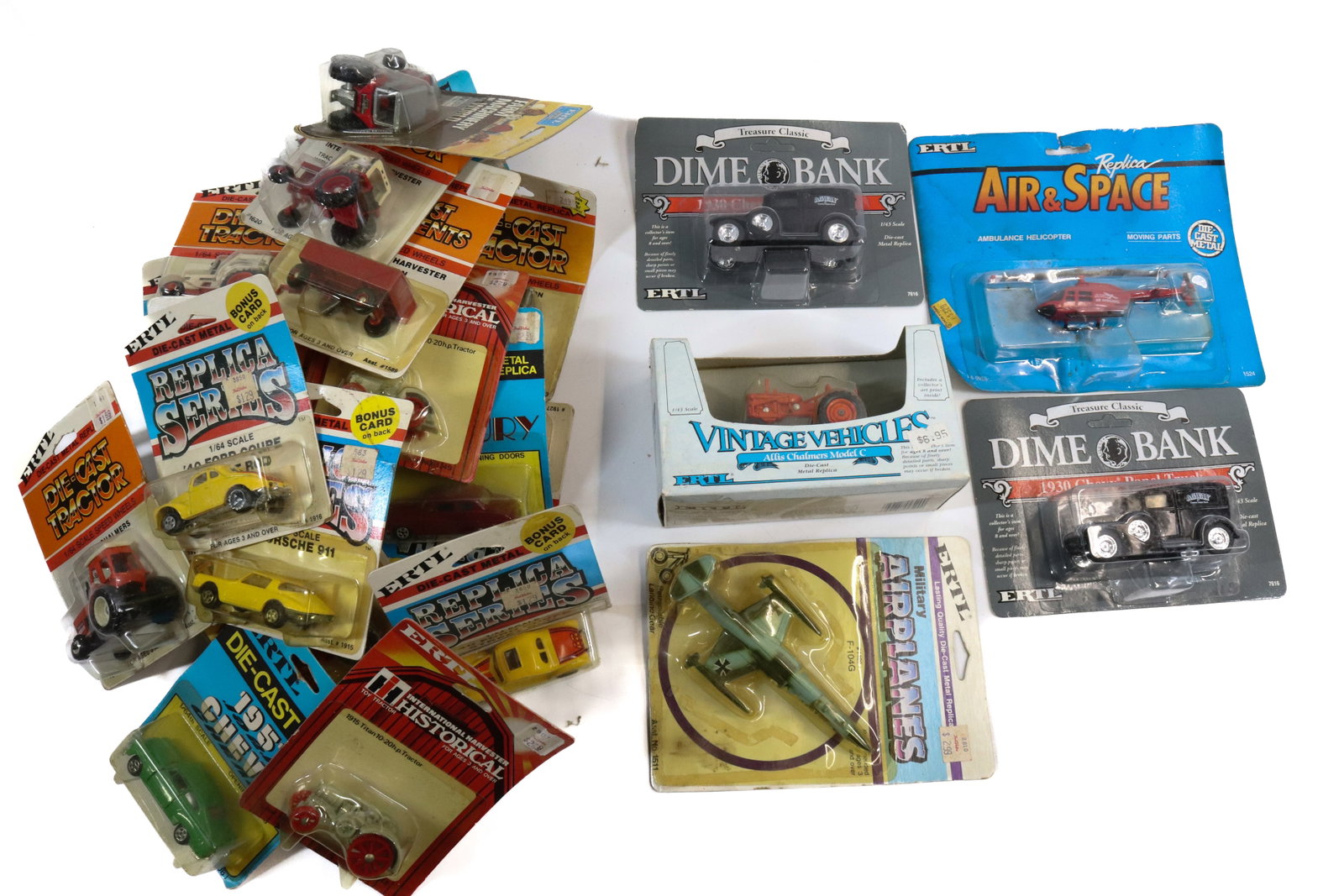 LOT OF ERTL TRACTORS, CARS AND TRUCKS: 20+ NIB TOYS