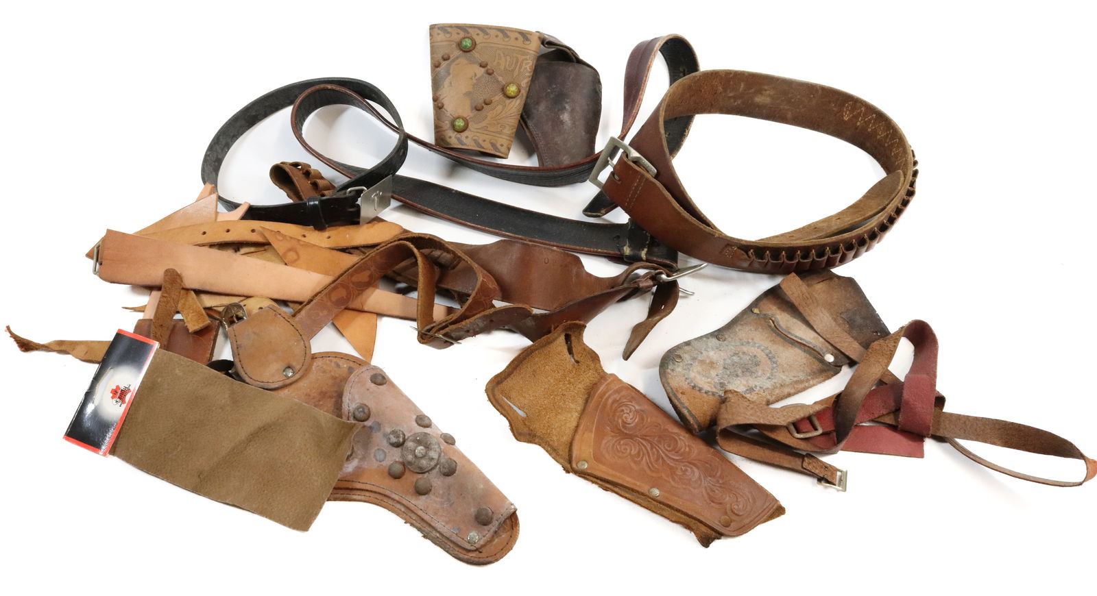 LOT OF CAP GUN HOLSTERS: VARIOUS PIECES AND PARTS.