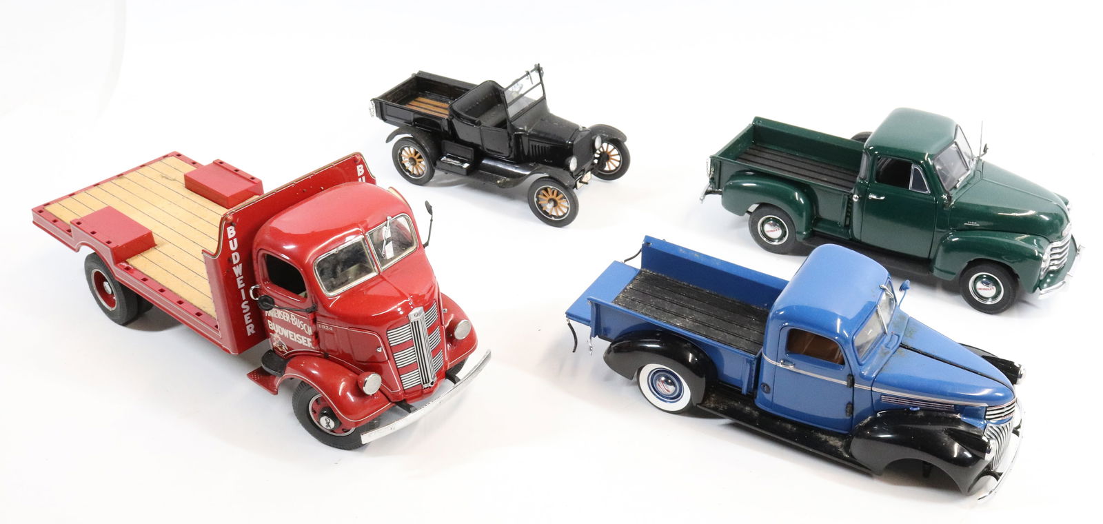 (4) DANBURY MINT MODEL TRUCKS (1 of 3)