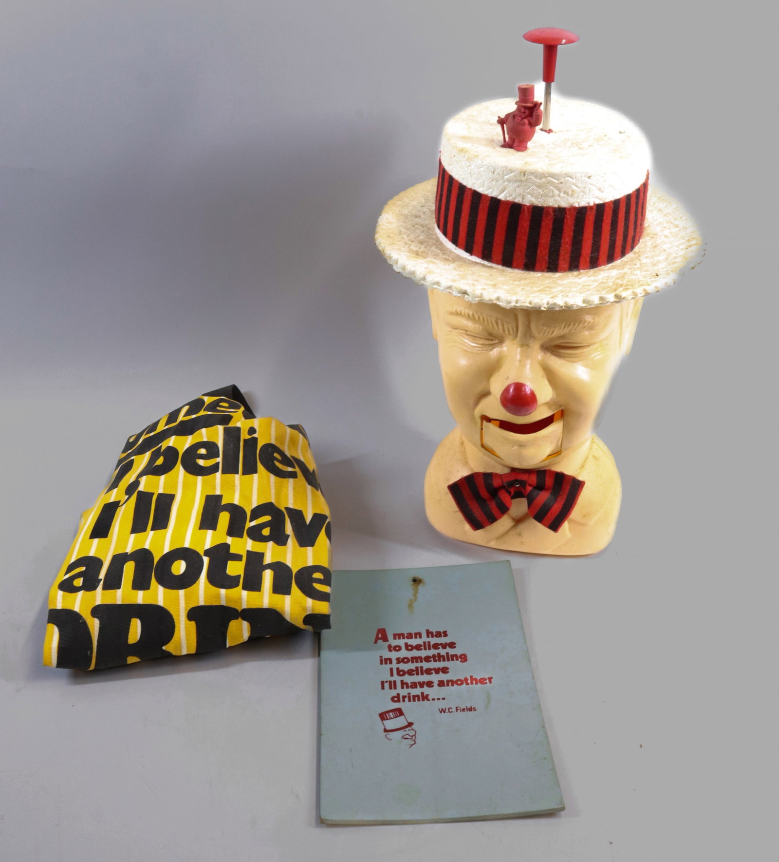 W.C. FIELDS PEANUT DISPENSER: COPYRIGHT 1981. 13" H. WITH, APRON AND PLAQUE.