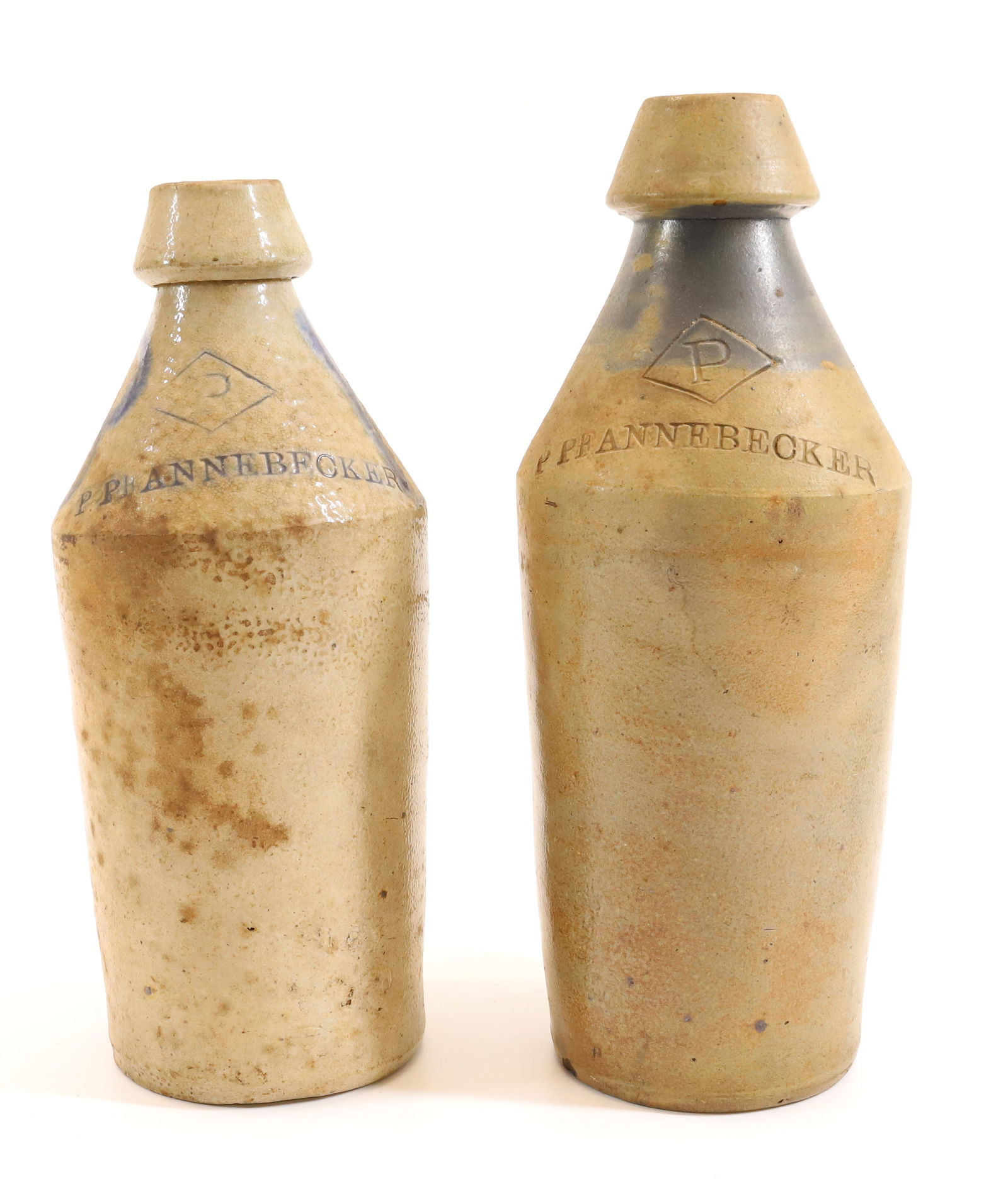 (2) STONEWARE ADVERTISING BOTTLES (1 of 5)