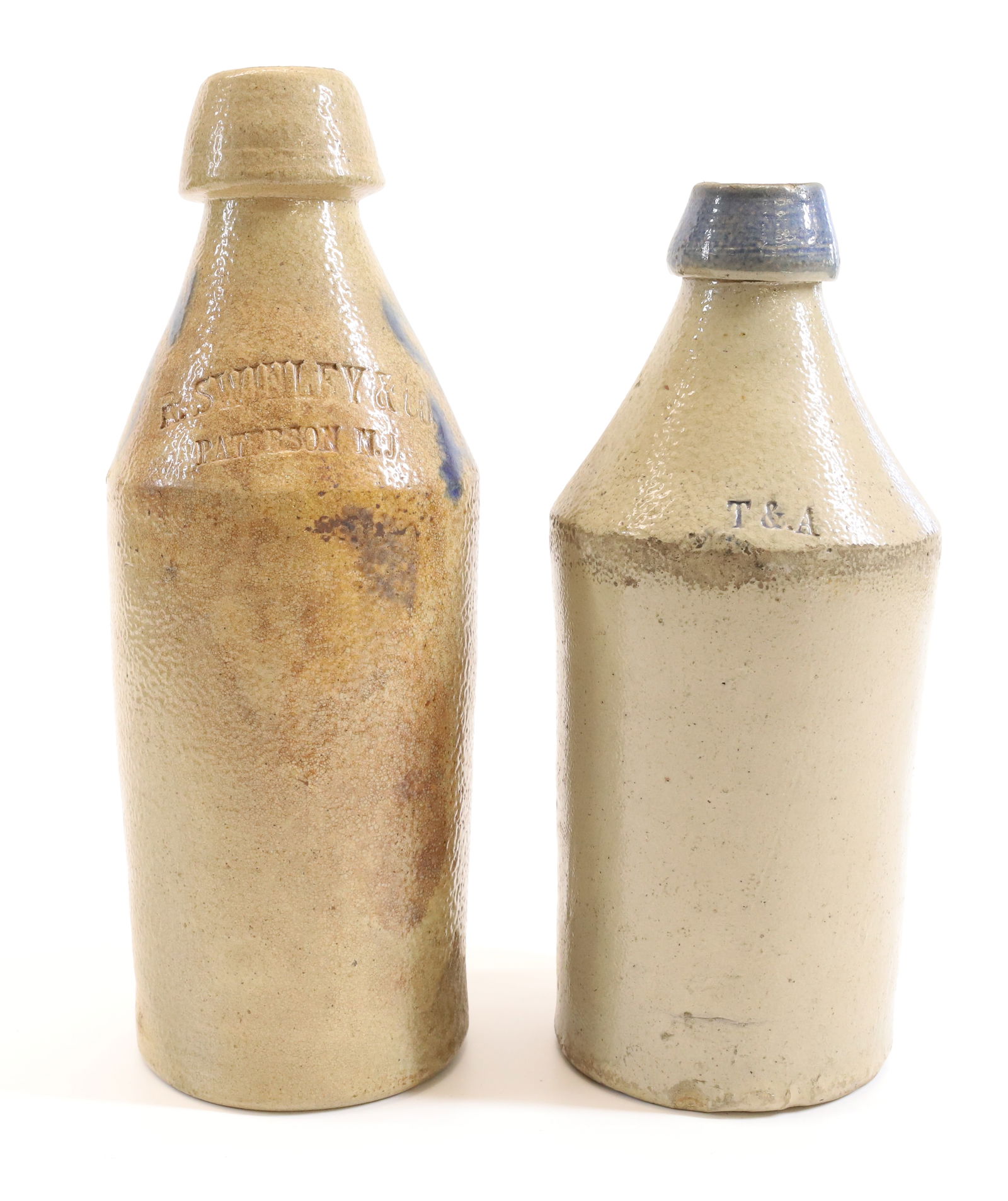 (2) STONEWARE ADVERTISING BOTTLES (1 of 7)