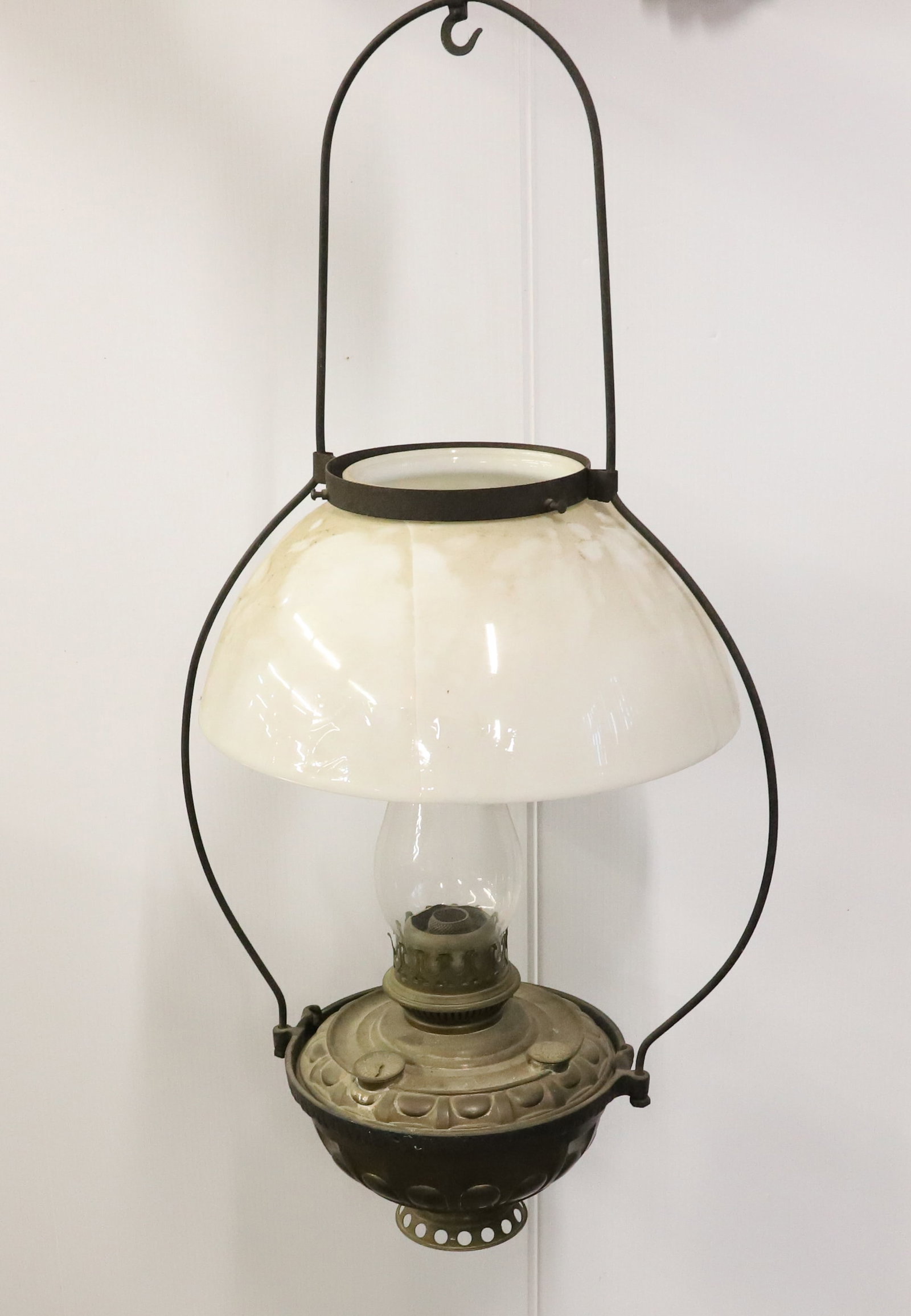 DRESDEN HANGING LIGHT: BRASS, CAST IRON AND MILK GLASS SHADE (CRACKED FROM TOP TO BOTTOM). 34" X 17". Terms: PLEASE READ CAREFULLY - Terms for Purchasing and Shipping of Auction Items. Please read carefully before bidding. 