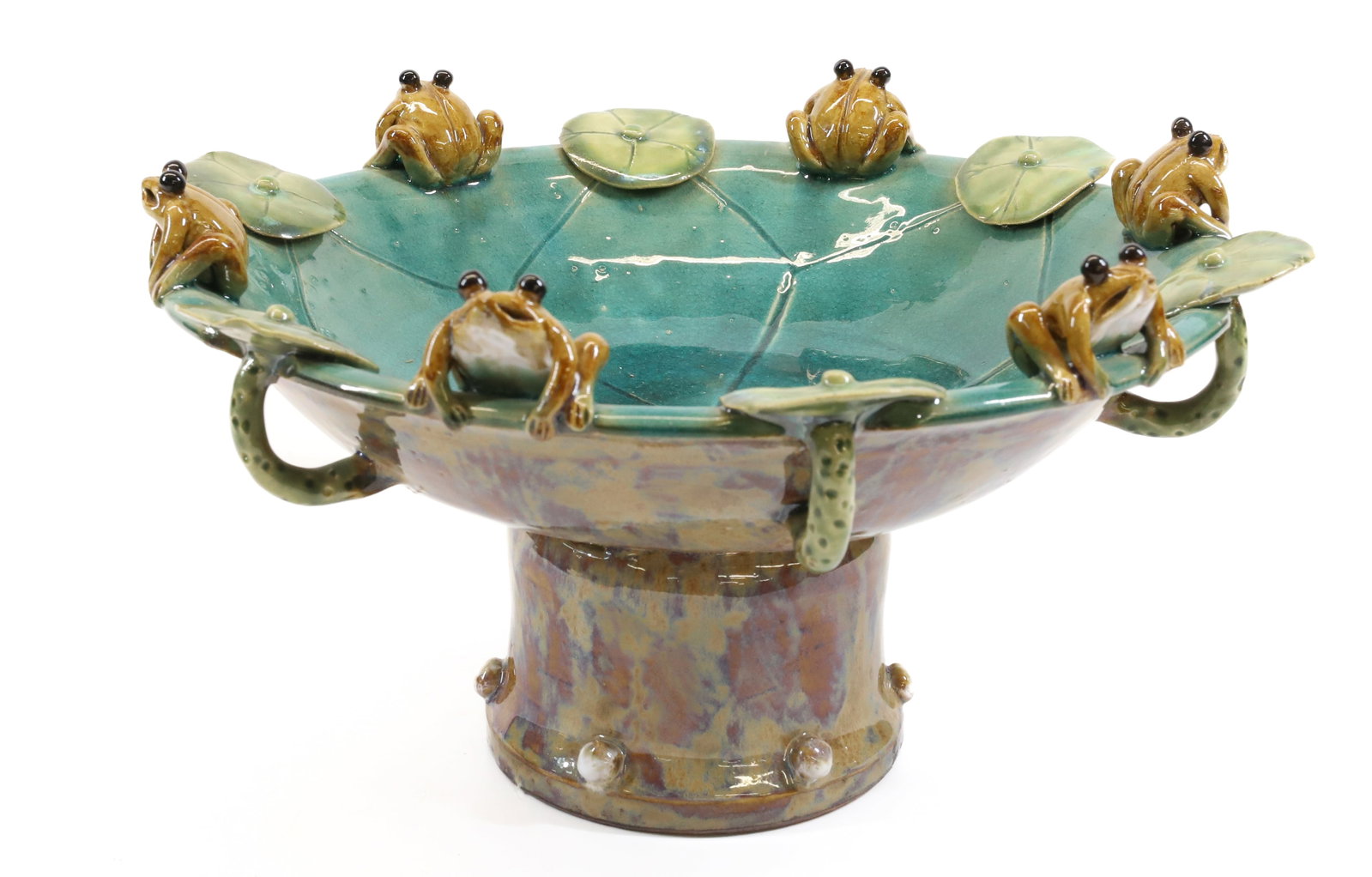 POTTERY FROG COMPOTE: FROGS AND LILY PADS ON EDGE. MULTI-COLOR GLAZE. # ON BOTTOM. 7" X 11 1/2". Terms: PLEASE READ CAREFULLY - Terms for Purchasing and Shipping of Auction Items. Please read carefully before bidding. All 