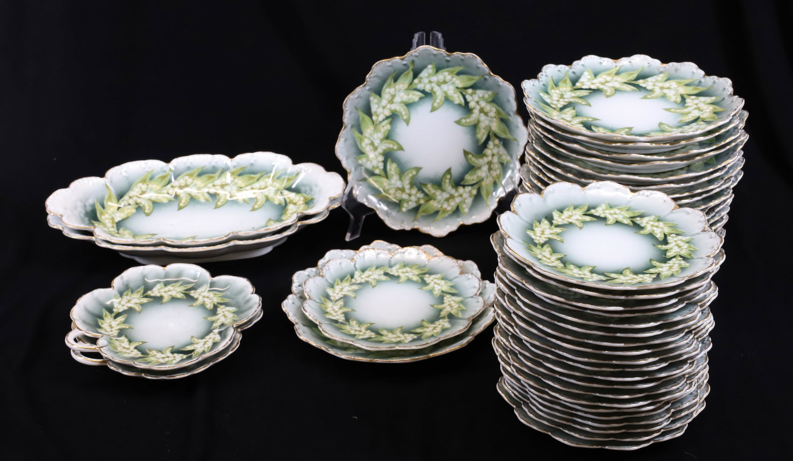 LOT OF BAVARIAN MALMAISON DISHES: (21) SMALL PLATES 6 3/4" D., (22) LARGE PLATES 8" D., (2) HANDLED PLATES 7" D. AND (2) OVAL PLATES 12" L. Terms: PLEASE READ CAREFULLY - Terms for Purchasing and Shipping of Auction Items. Please read