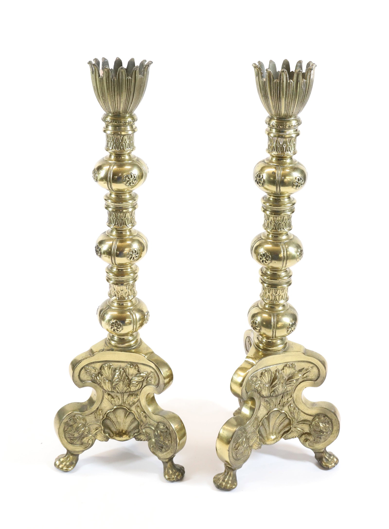 PAIR OF BRASS CANDLEHOLDERS: ORNATE STYLE. APPEAR DRILLED FOR LAMP BASES. 20 1/2" H. Terms: PLEASE READ CAREFULLY - Terms for Purchasing and Shipping of Auction Items. Please read carefully before bidding. All payments for purcha