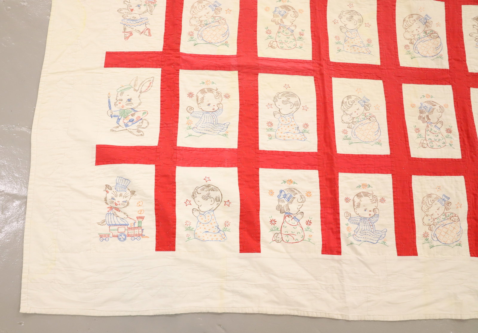 VINTAGE HAND STITCHED QUILT: RED/WHITE GRID WITH LITTLE BOYS/GIRLS/ANIMALS. 76" X 64". Terms: PLEASE READ CAREFULLY - Terms for Purchasing and Shipping of Auction Items. Please read carefully before bidding. All payments for purc