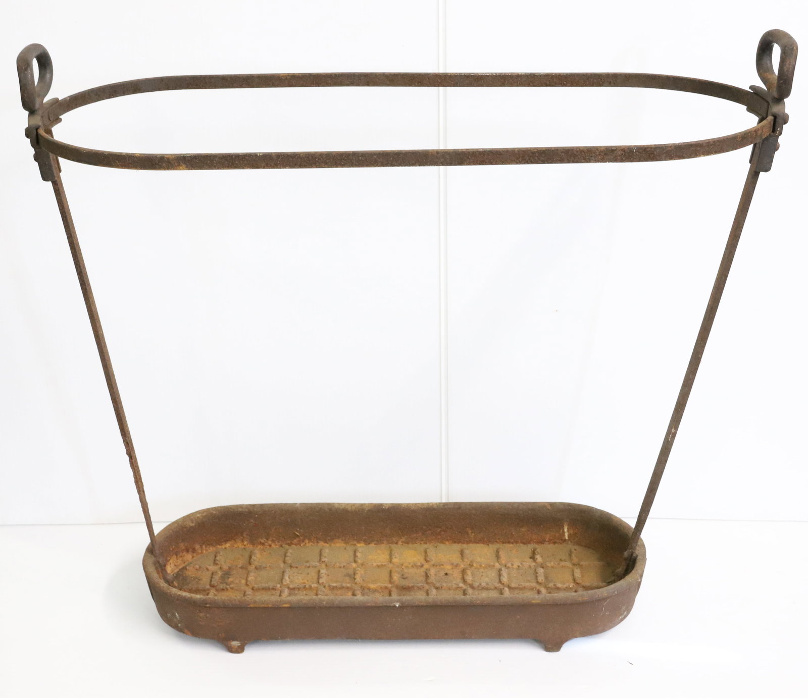 CAST IRON UMBRELLA HOLDER: HEAVY CAST IRON WITH HANDLE ON EITHER END. UNMARKED. 26" X 29". Terms: PLEASE READ CAREFULLY - Terms for Purchasing and Shipping of Auction Items. Please read carefully before bidding. All payments fo