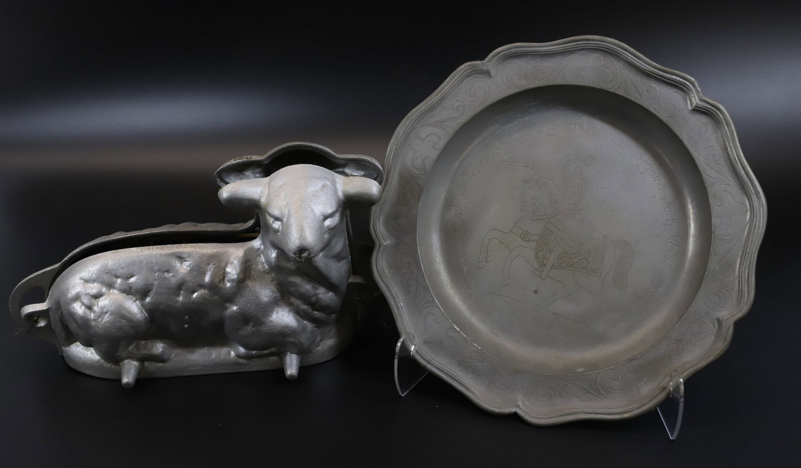 LAMB MOLD AND DECORATED PEWTER CHARGER: TWO-PIECE MOLD MRKD. KANTER MFG. CO. 12" L. CHARGER HAS GERMAN VERSE AND RIDER ON HORSE WITH 1652 DATE (MRKD. ON BACK "PROBZIN" WITH ANGEL WITH SWORD AND SCALES. 11 3/4" D. Terms: PLEASE READ CAREFULL