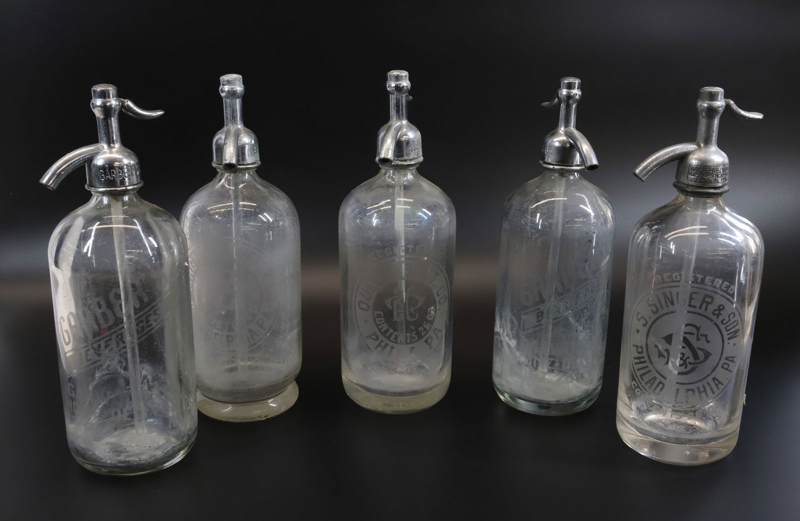 (5) SELTZER ADVERTISING BOTTLES (1 of 5)