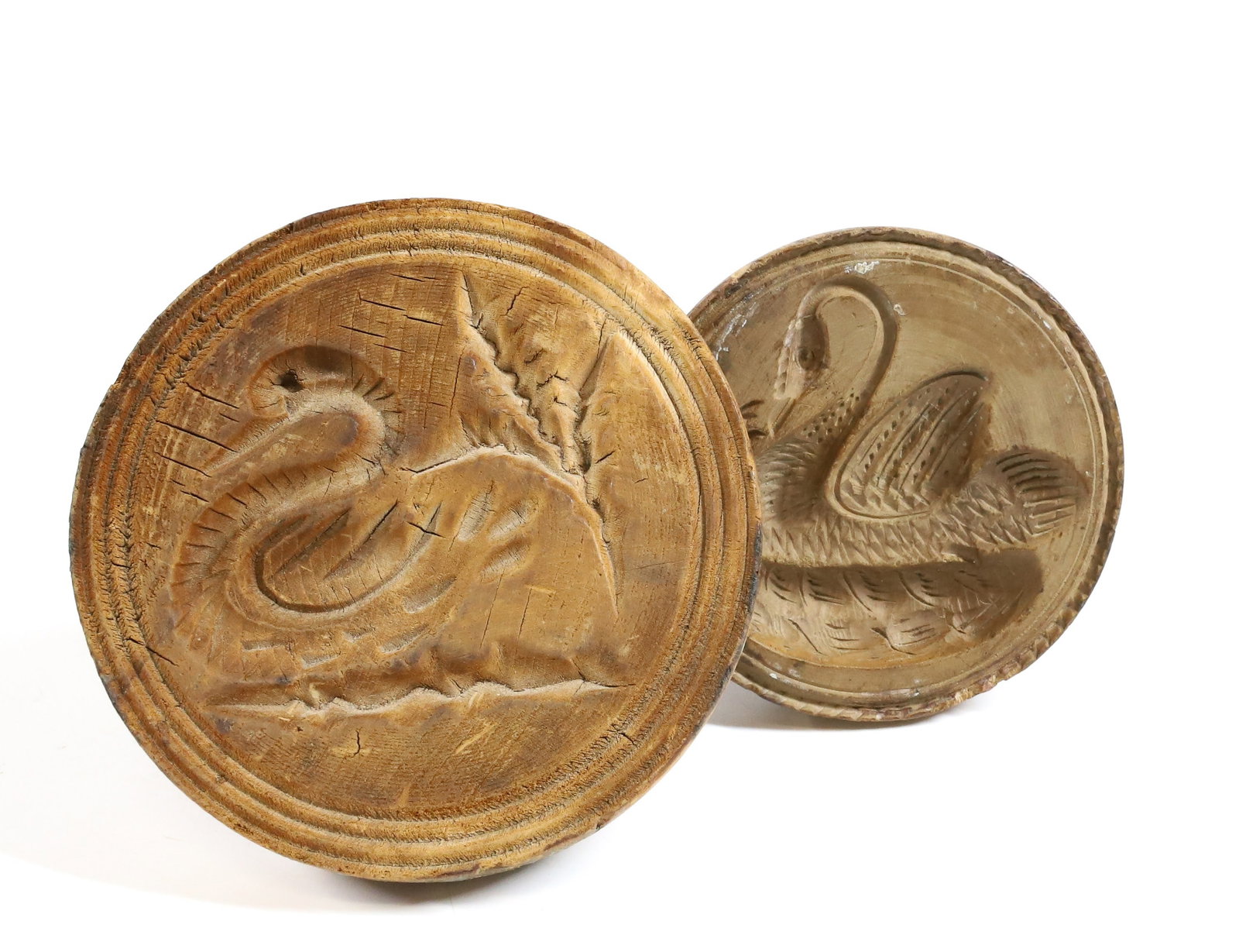 (2) CARVED SWAN BUTTER STAMPS: NICELY CARVED SWAN MOTIFS. 3" AND 3 3/4" DIAMETERS PLEASE READ CAREFULLY - Terms for Purchasing and Shipping of Auction Items. Please read carefully before bidding. All payments for purchases will be 