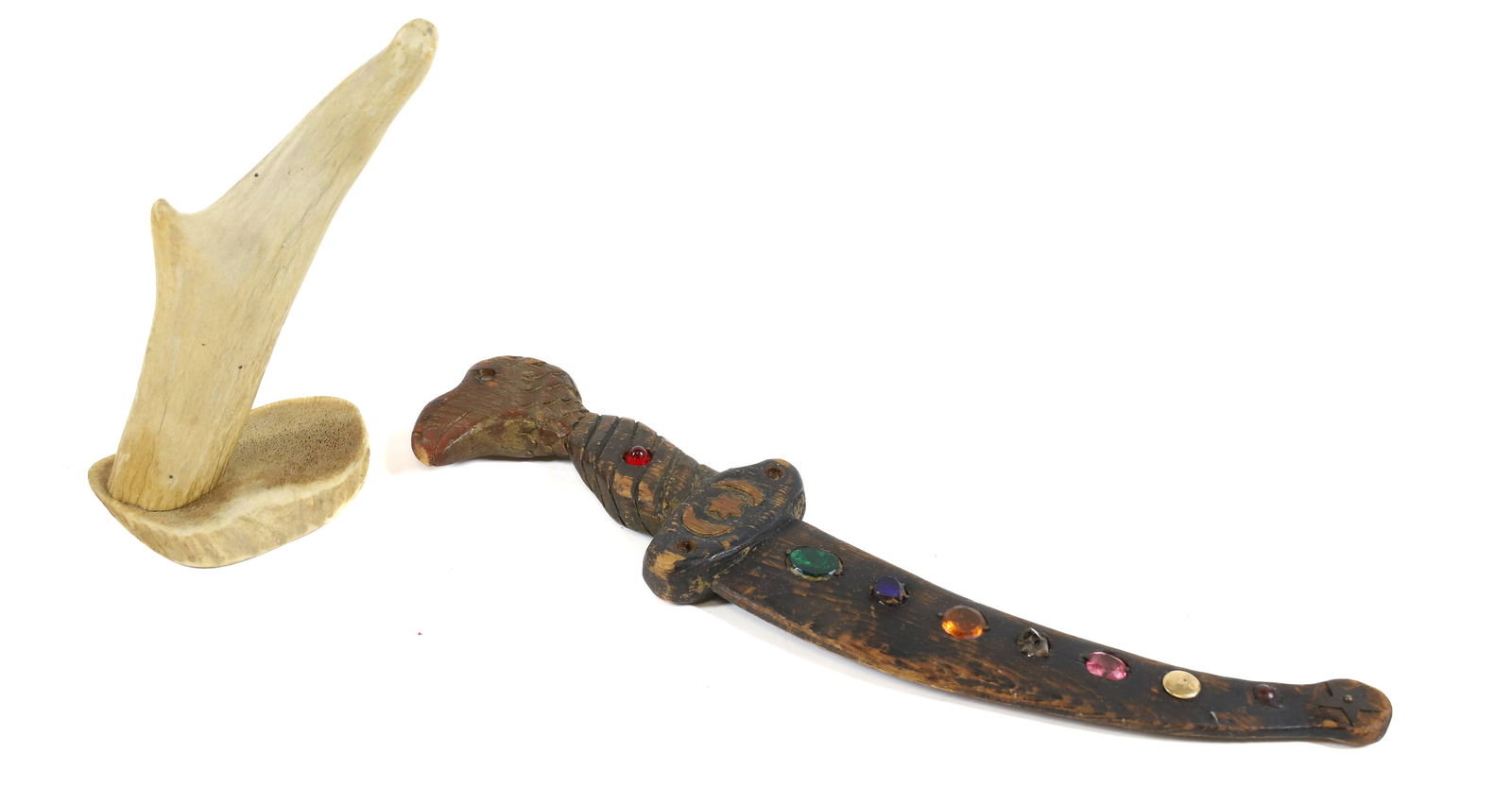 LODGE DAGGER AND ANTLER: CARVED WOODEN DAGGER WITH INSET JEWELS 14" L. ANTLER 8" L. ATTACHED TO BONE BASE. PLEASE READ CAREFULLY - Terms for Purchasing and Shipping of Auction Items. Please read carefully before bidding. All