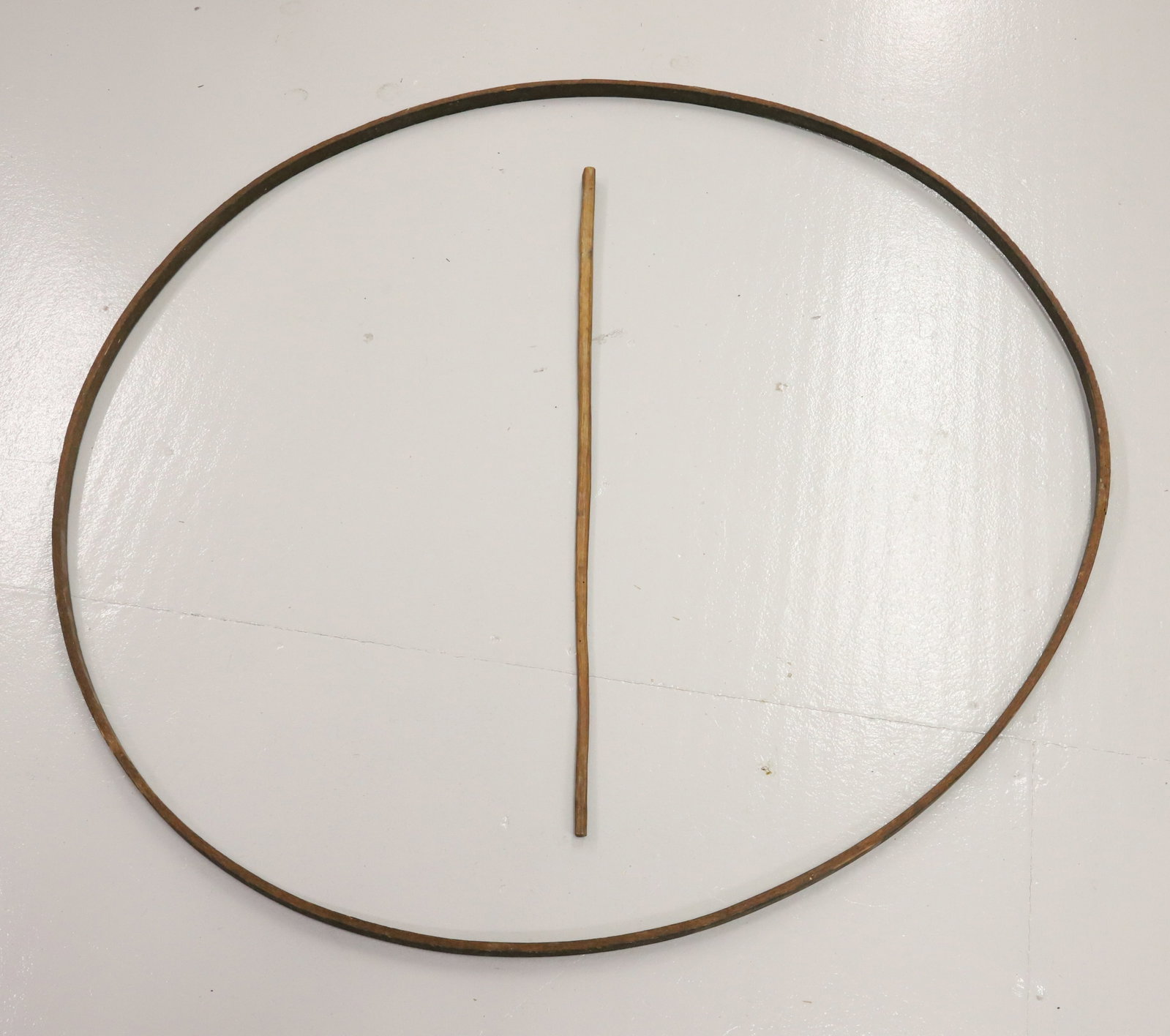 EARLY WOODEN STICK AND HOOP TOY: BENTWOOD AND CARVED STICK. 40" D. PLEASE READ CAREFULLY - Terms for Purchasing and Shipping of Auction Items. Please read carefully before bidding. All payments for purchases will be made through Live