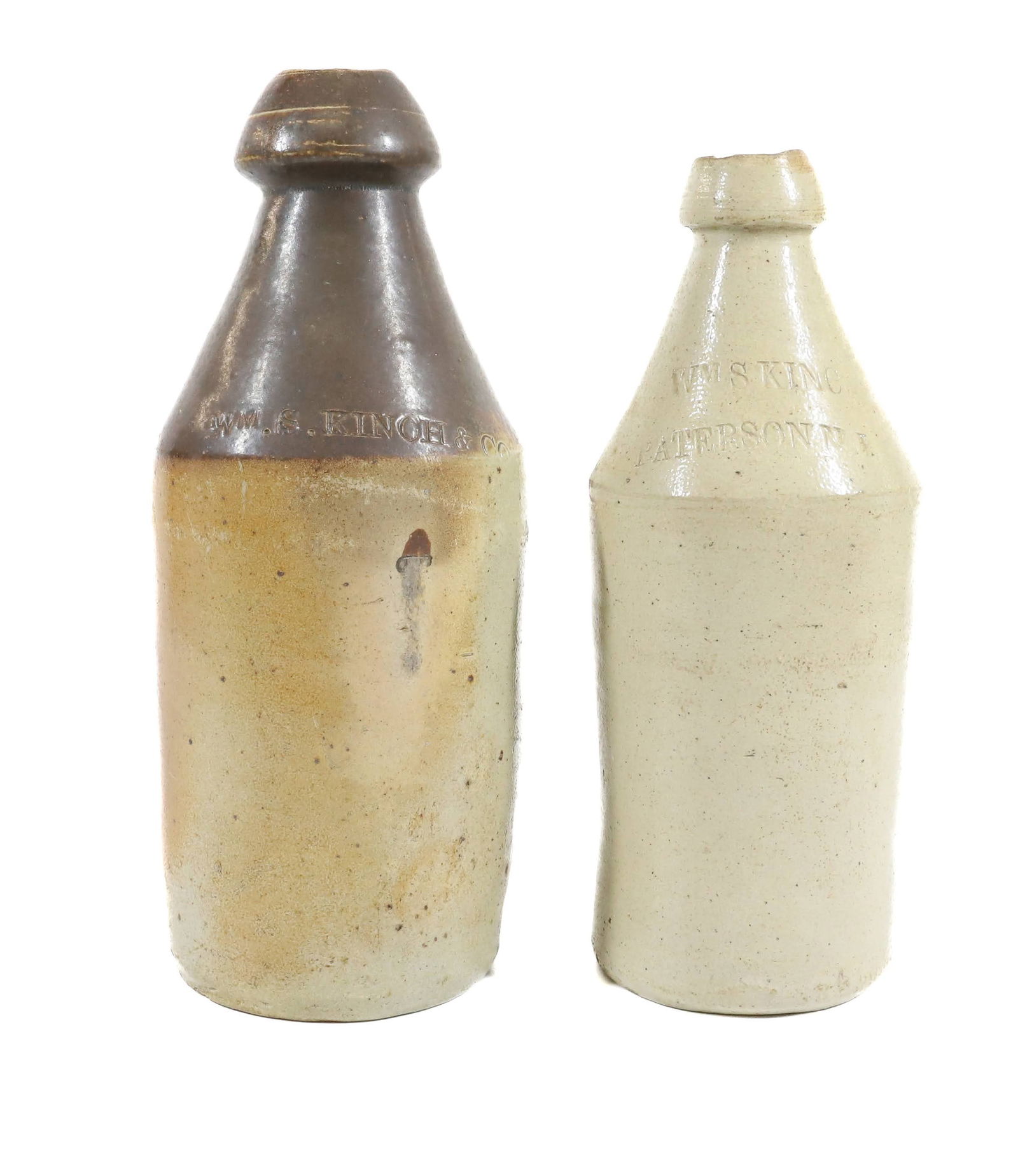 (2) STONEWARE ADVERTISING BOTTLES (1 of 5)