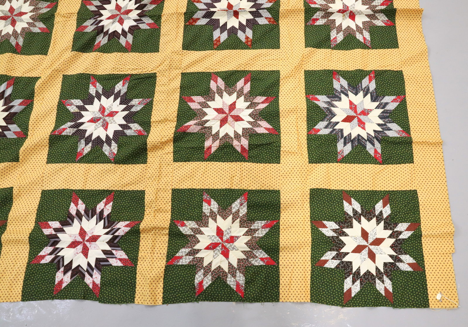 ANTIQUE QUILT TOP: ORANGE MIN FLORAL BACKGROUND WITH DARK GREEN SQUARES WITH STARS. 74" X 72". PLEASE READ CAREFULLY - Terms for Purchasing and Shipping of Auction Items. Please read carefully before bidding. All paymen
