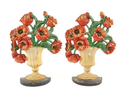 PAIR OF CAST IRON DOORSTOPS: FLOWERS IN URN. #440. 10 3/4" H. PLEASE READ CAREFULLY - Terms for Purchasing and Shipping of Auction Items. Please read carefully before bidding. All payments for purchases will be made through LiveA