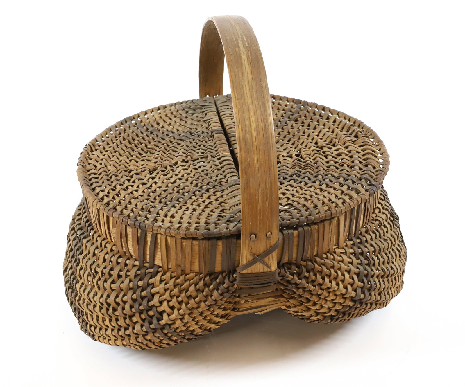 19TH CENTURY LIDDED BUTTOCKS BASKET: HALF MOON LIDS, BENTWOOD HANDLES, AND DARK WEAVER PATTERN - 10 1/2" L