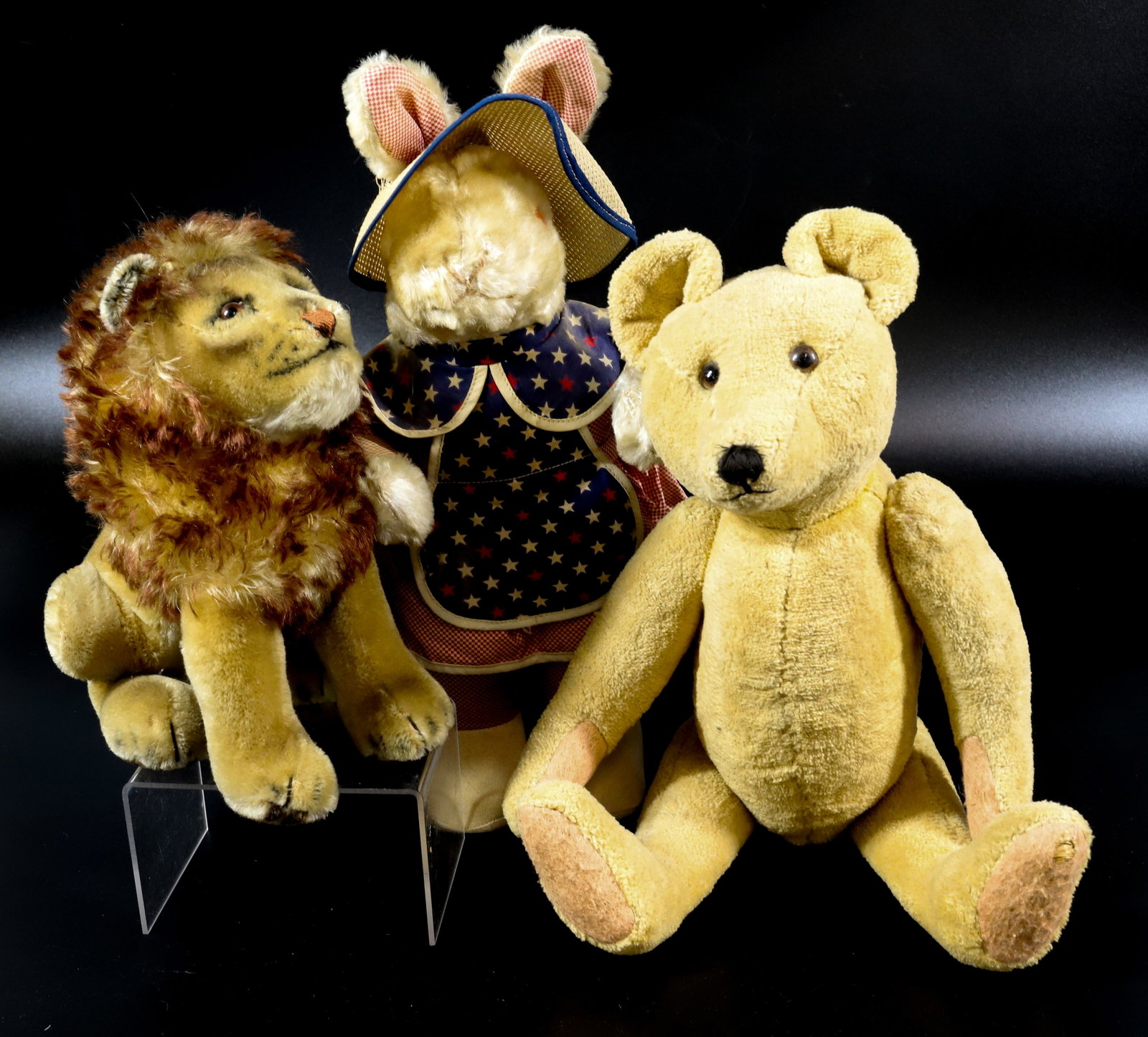 EARLY STUFFED ANIMAL LOT: STEIFF LION (9"), JOINTED TEDDY BEAR WITH HUMP BACK (16" L), AND PATRIOTIC RABBIT (15" H)