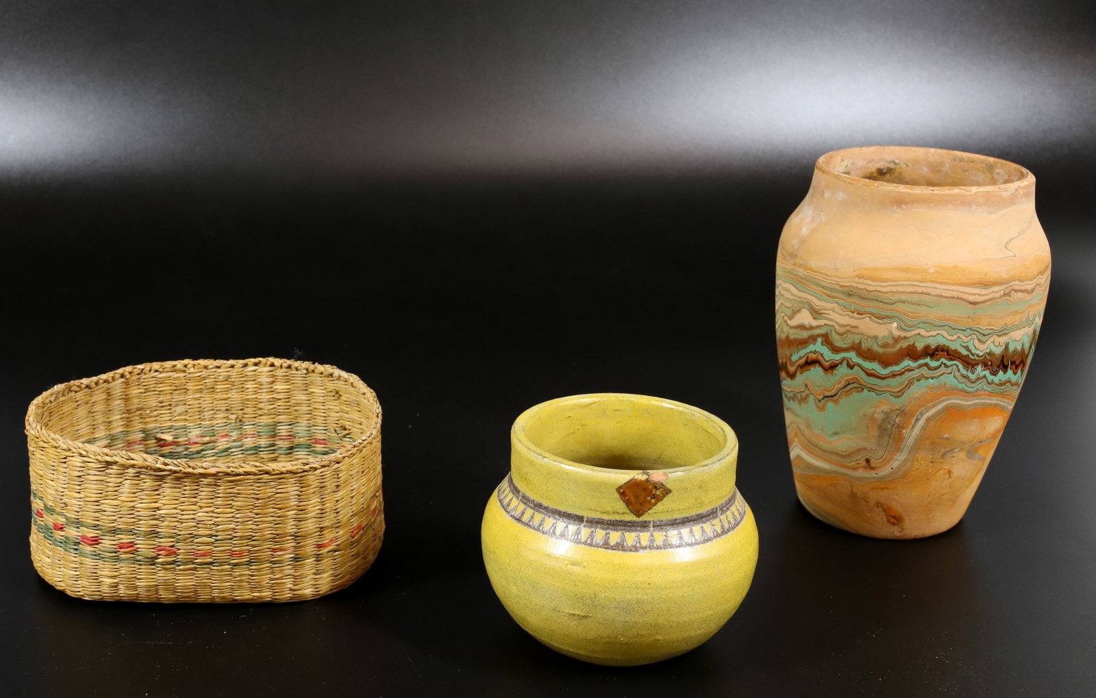 VINTAGE POTTERY AND BASKET LOT: BADLANDS POTTERY VASE (MRKD. ON BOTTOM) 6 1/4" H., SQUATTY YELLOW GLAZE POT (SGND. ON BOTTOM) 3 1/4" H. AND OVAL WOVEN BASKET 5 1/2" L.