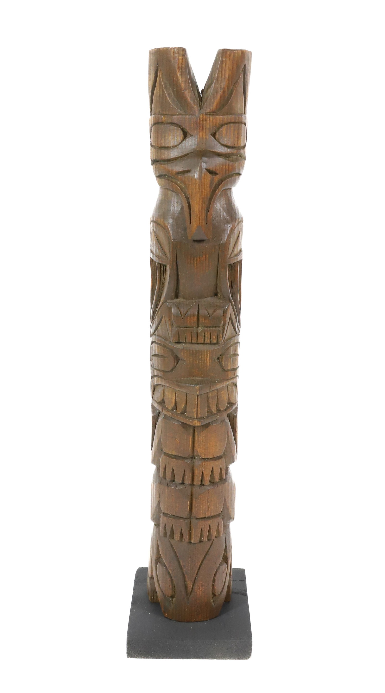RICK WILLIAMS CARVED TOTEM: CARVED AND UNPAINTED. MRKD. ON BACK. 18 3/4" H.