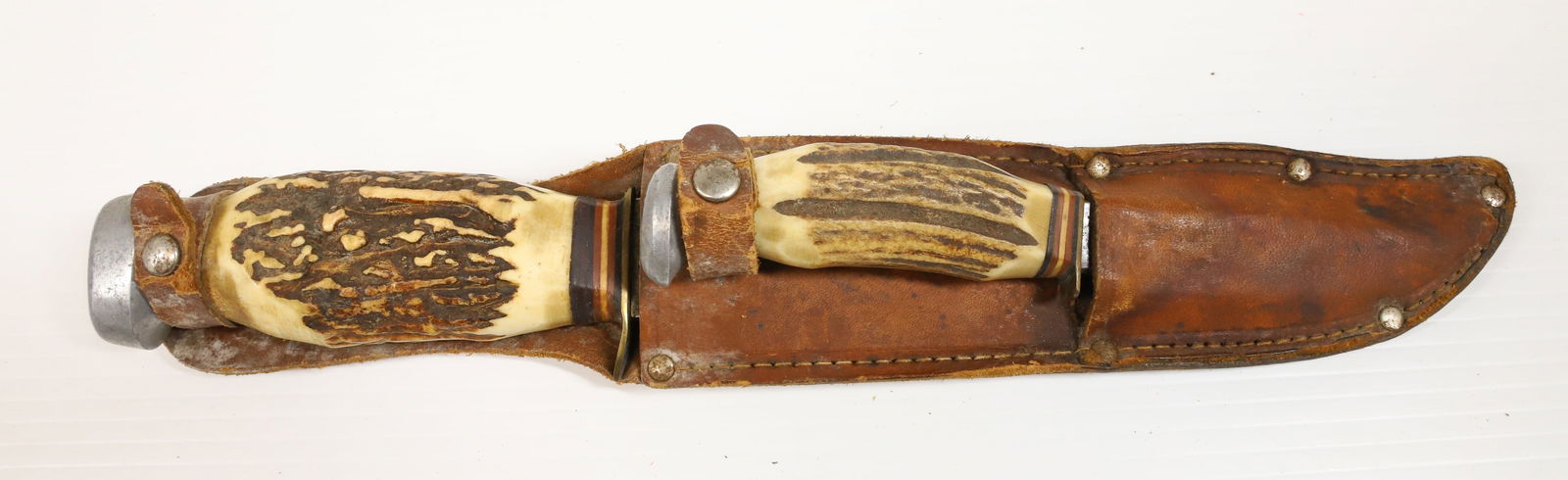 BARON COMBINATION KNIFE SET: BARON BOWIE KNIFE AND SKINNER, SOLINGEN GERMANY, WITH LEATHER SHEATH - BOWIE KNIFE 8 3/4" BLADE, 13 1/4" OVERALL UPDATED 2024 TERMS FOR PURCHASING AND SHIPPING OF AUCTION ITEMS. PLEASE READ CAREFULLY