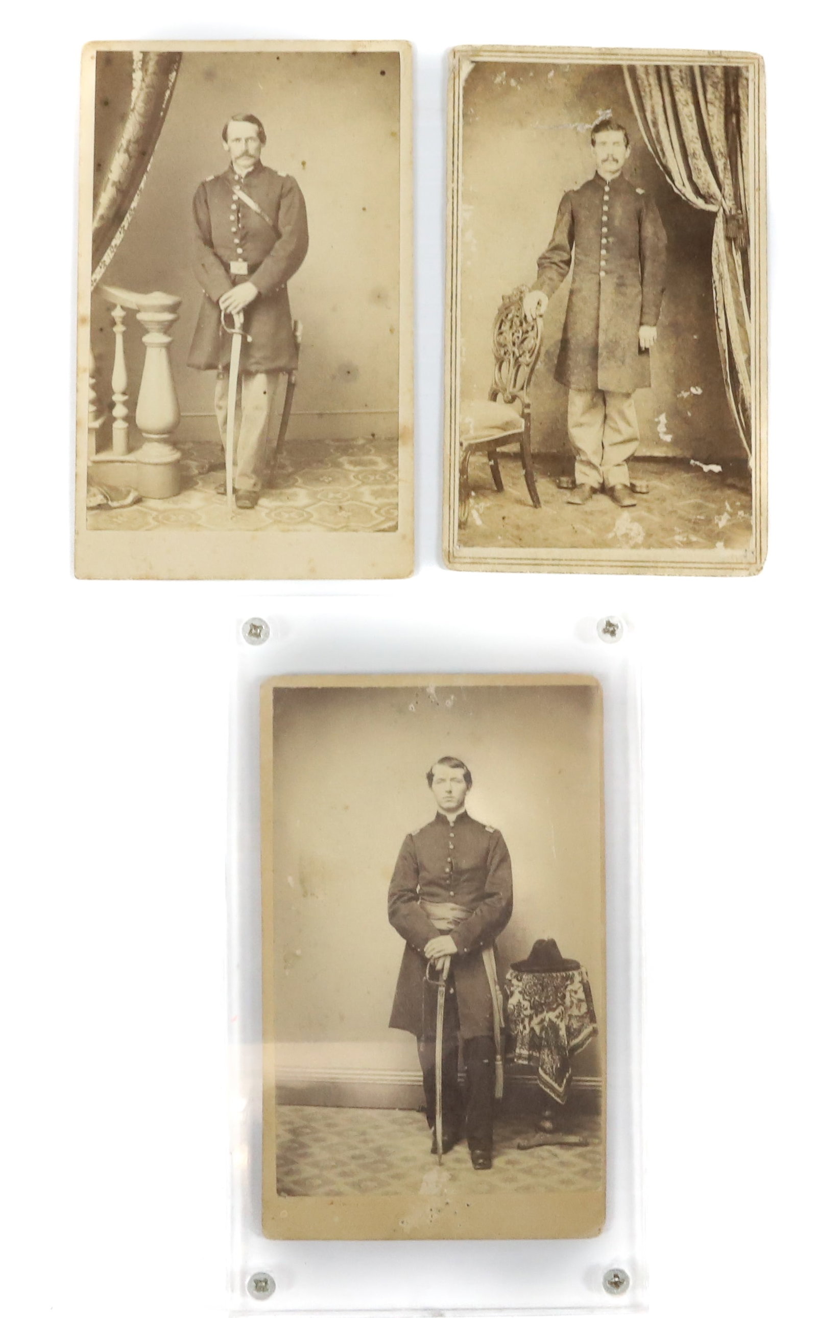 (3) CIVIL WAR OFFICERS, CDVs: UNIDENTIFIED. STAMPED ON BACK "REHN & SONS, PHILADELPHIA", EWING & PAINTER, HARRISBURG, PA" AND "B.S. JACOBY, STROUDSBURG, PA". 4" X 2 3/8". UPDATED 2024 TERMS FOR PURCHASING AND SHIPPING OF AUCTION I