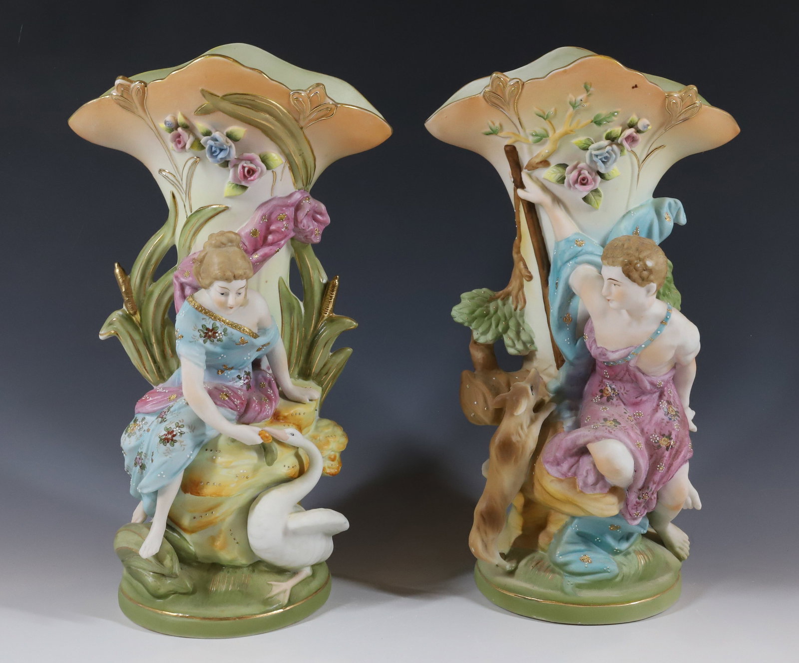 VINTAGE BISQUE STATUE SET: MAN AND WOMAN WITH ANIMALS PLEASE READ CAREFULLY - Terms for Purchasing and Shipping of Auction Items. Please read carefully before bidding. All payments for purchases will be made through LiveAuction