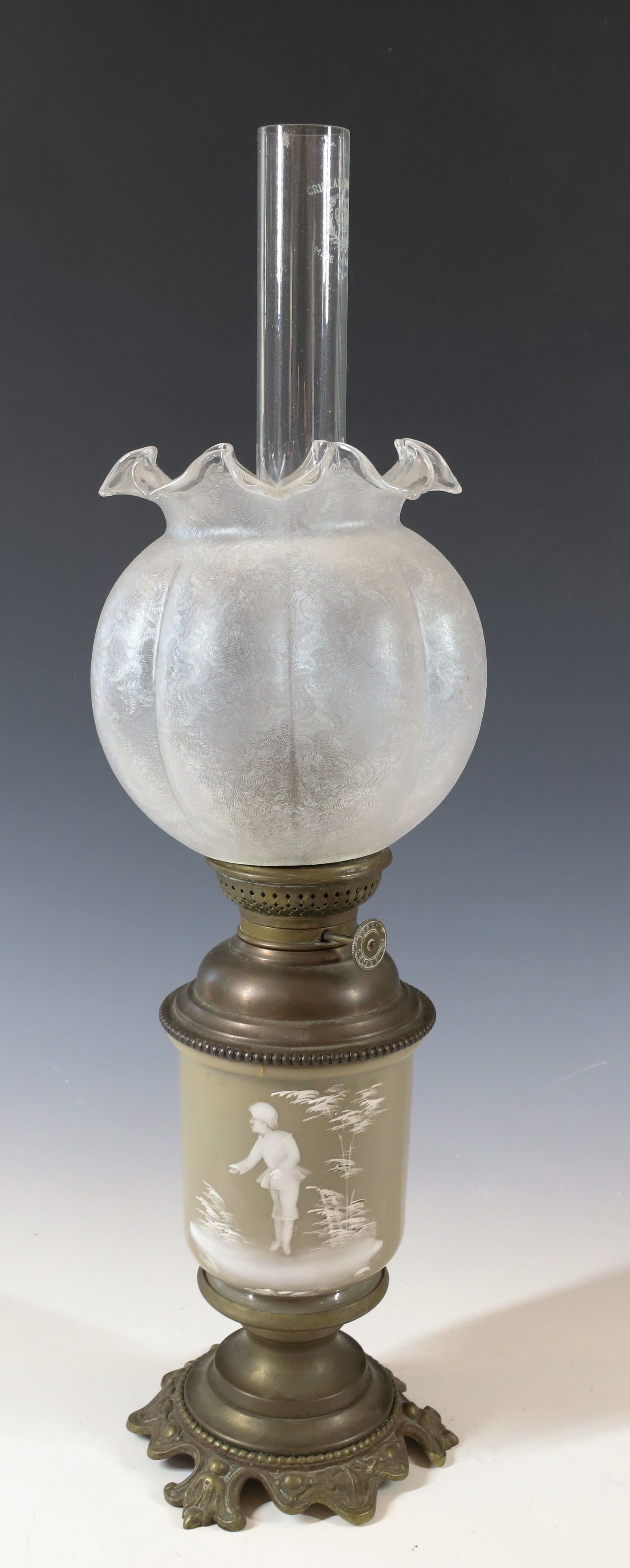 MARY GREGORY KEROSENE LAMP: TAUPE COLOR GLASS BOY IN KNICKERS CLEAR PATTERNED SHADE ORIGINAL BURNER CHIMNEY BRASS MOUNTS 19 3/4" PLEASE READ CAREFULLY - Terms for Purchasing and Shipping of Auction Items. Please read carefully b