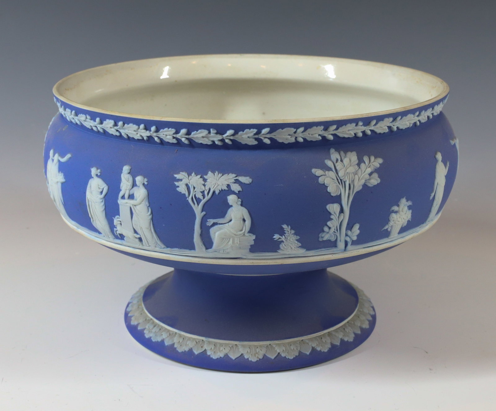 VINTAGE WEDGWOOD FOOTED BOWL: PORTLAND BLUE MARKED WEDGWOOD MADE IN ENGLAND WITH METAL FLOWER FROG 5" X 7 1/2" DIA PLEASE READ CAREFULLY - Terms for Purchasing and Shipping of Auction Items. Please read carefully before bidding. A