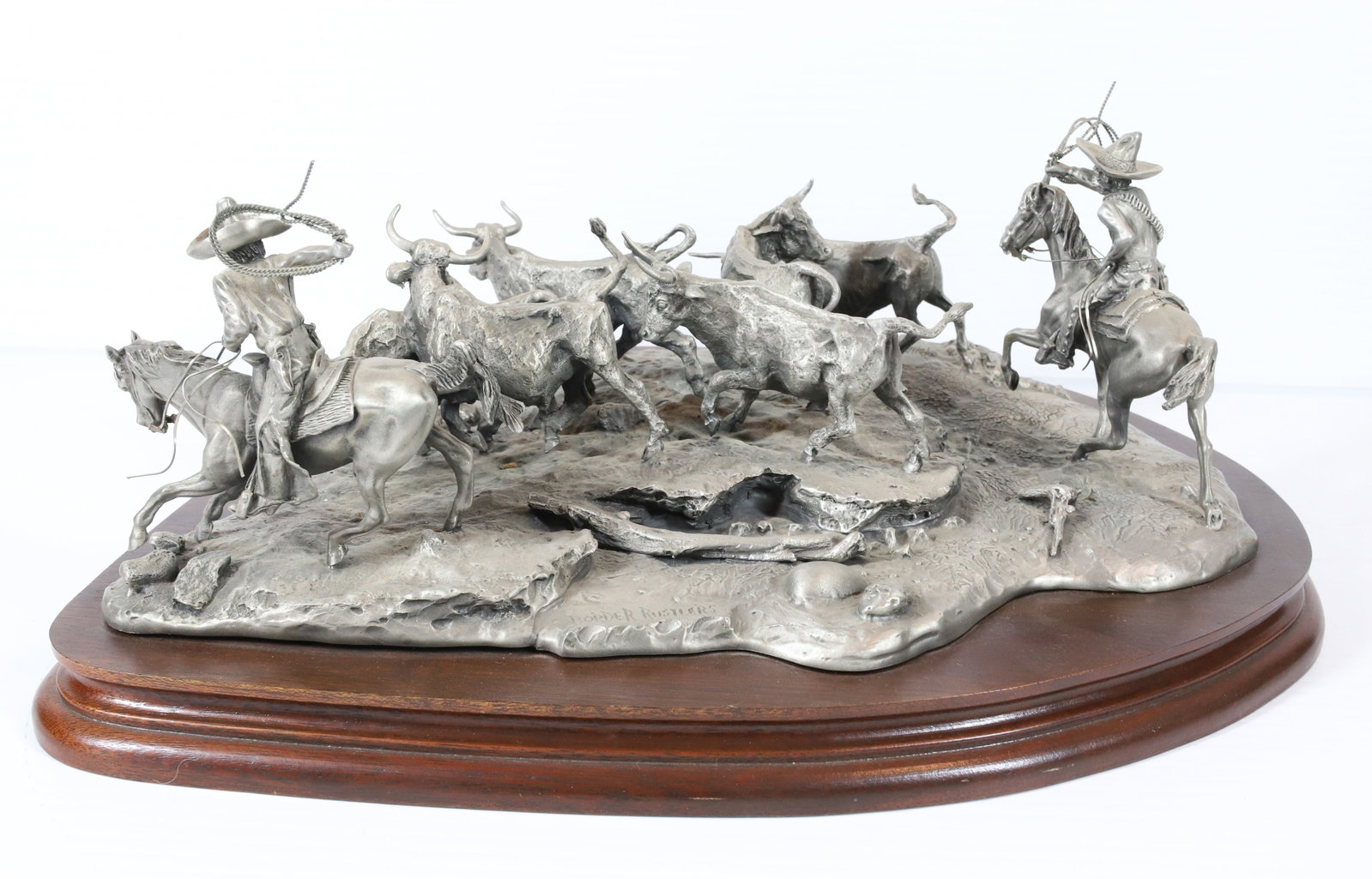 CHILMARK SCULPTURE: BOUDER RUSTLERS... 15" x 12" x 6 1/2". PLEASE READ CAREFULLY - Terms for Purchasing and Shipping of Auction Items. Please read carefully before bidding. All payments for purchases will be made through