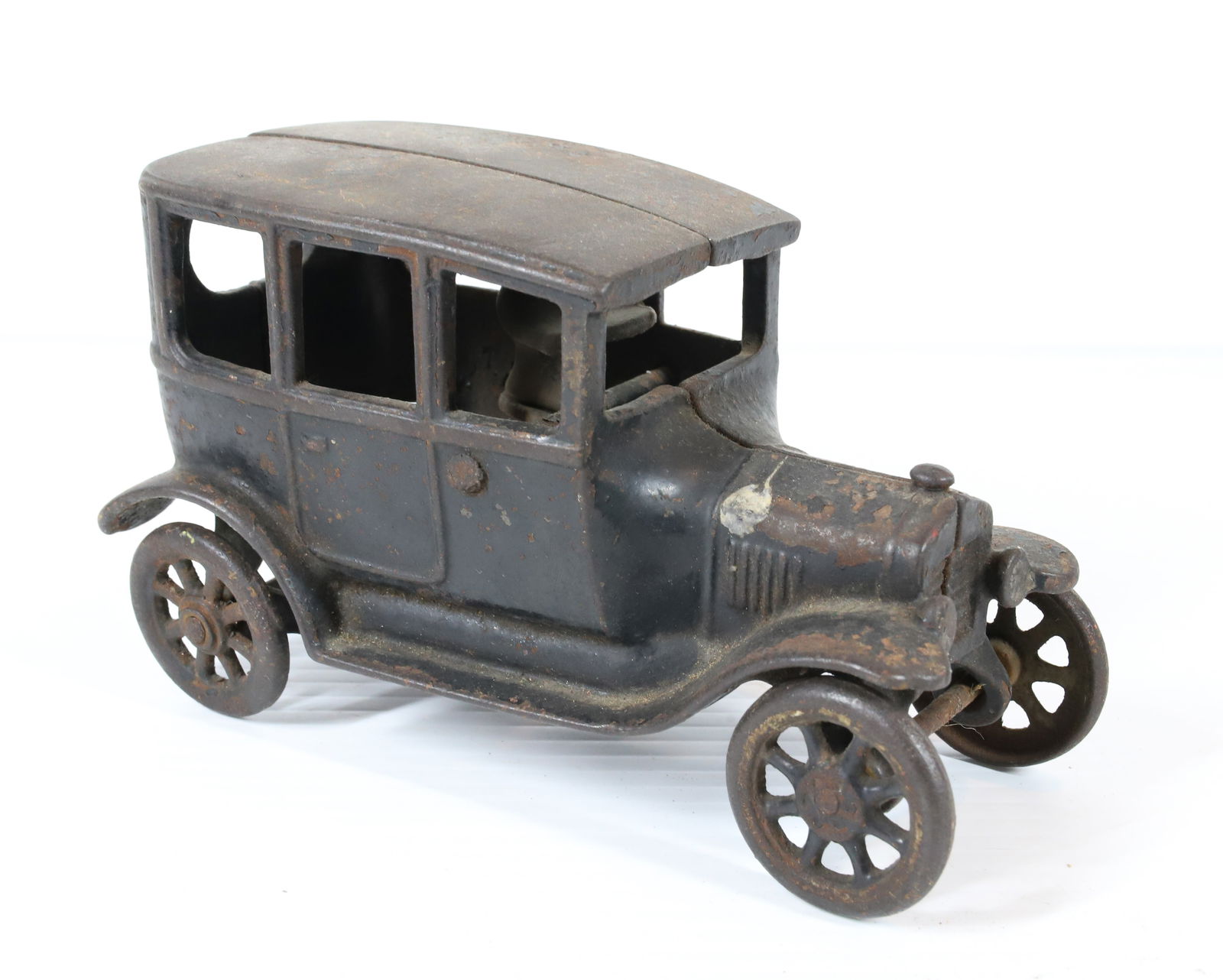 MODEL T TOY CAR: CAST IRON FORD MODEL T CAR WITH DRIVER PLEASE READ CAREFULLY - Terms for Purchasing and Shipping of Auction Items. Please read carefully before bidding. All payments for purchases will be made through