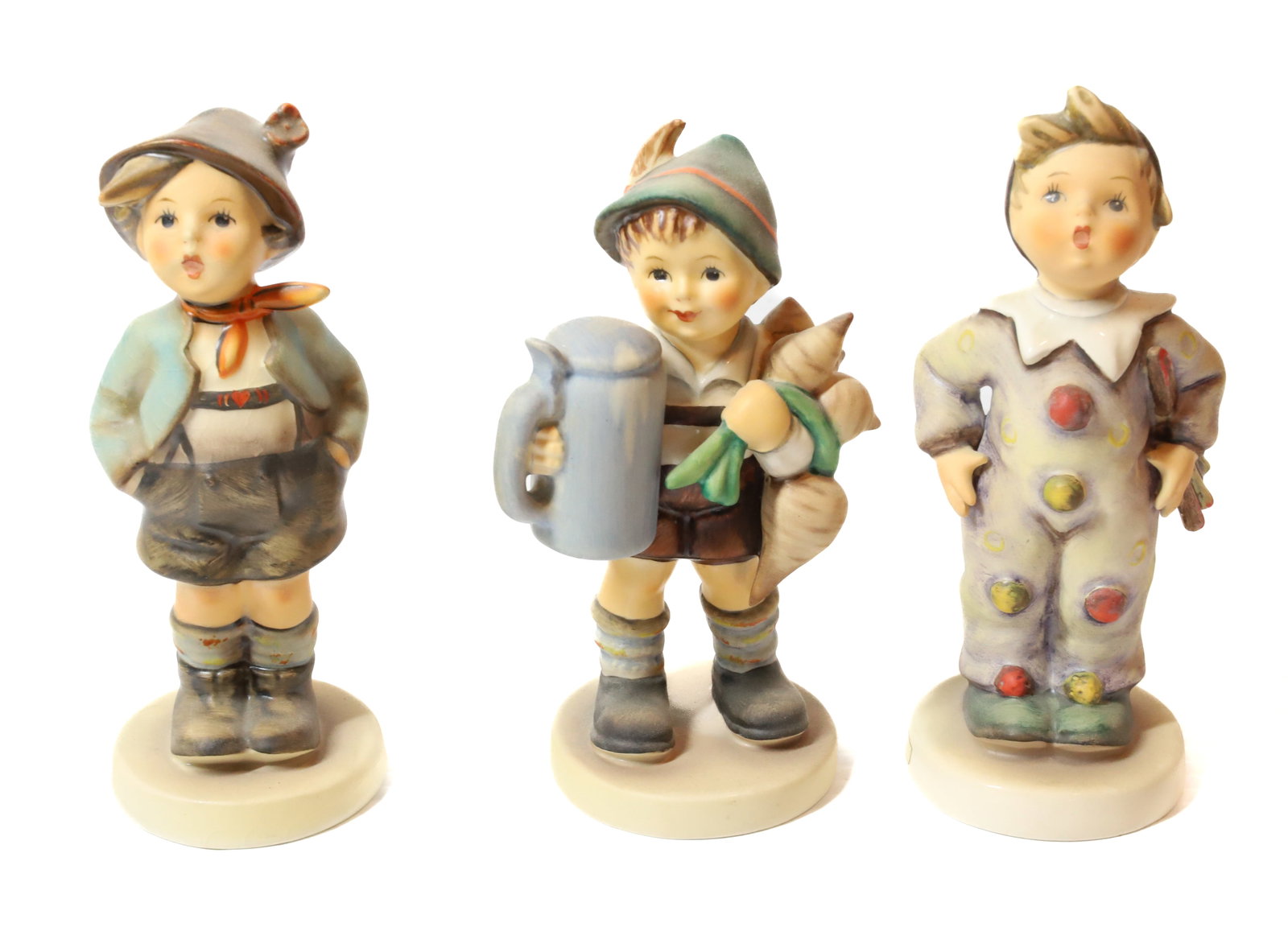 HUMMEL FIGURINE: CARNIVAL 6" H, FOR FATHER AND BROTHER. TMK-5 MARKS PLEASE READ CAREFULLY - Terms for Purchasing and Shipping of Auction Items. Please read carefully before bidding. All payments for purchases will be 