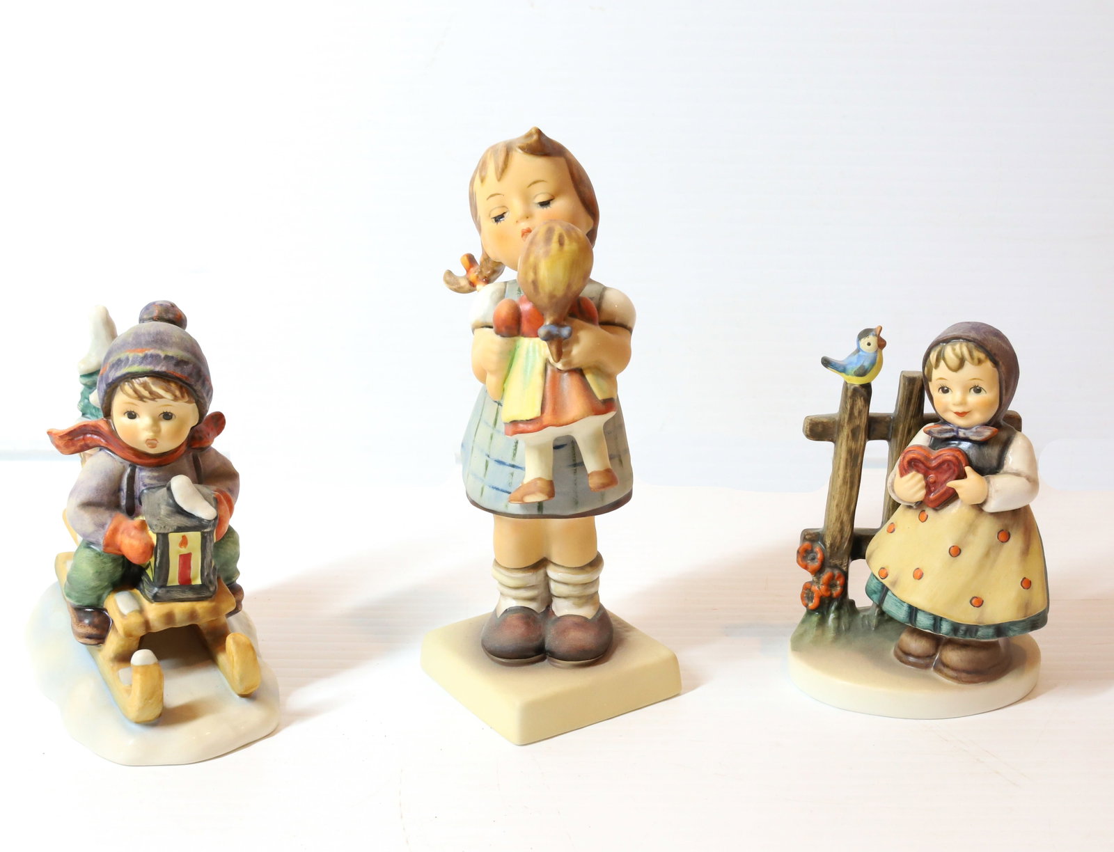 HUMMEL FIGURINE: KISS TMK-5 MARKINGME 6"H, RIDE INTO CHRISTMAS AND SWEET GREETING. PLEASE READ CAREFULLY - Terms for Purchasing and Shipping of Auction Items. Please read carefully before bidding. All payments for pur