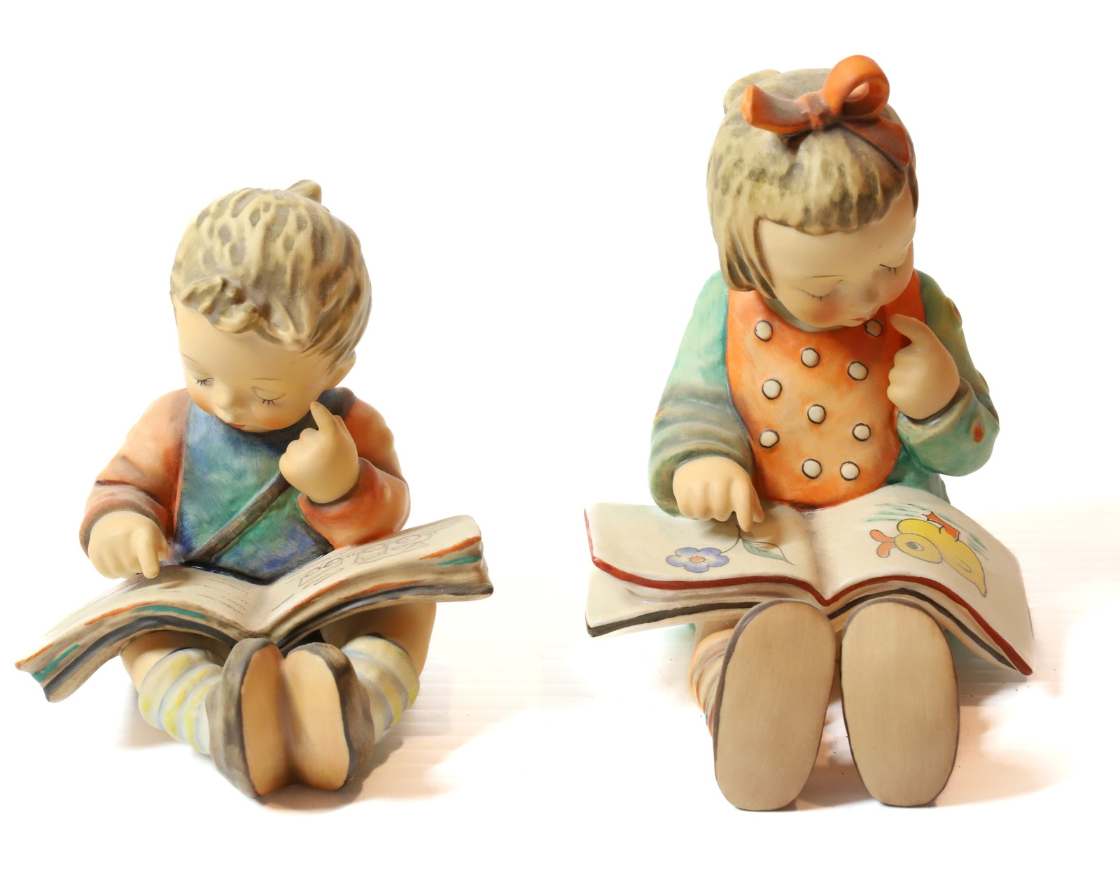 HUMMEL FIGURINES: BOOKWORM 5 1/2 " H AND THOUGHTFUL. TMK-5 AND 6 MARK PLEASE READ CAREFULLY - Terms for Purchasing and Shipping of Auction Items. Please read carefully before bidding. All payments for purchases will be