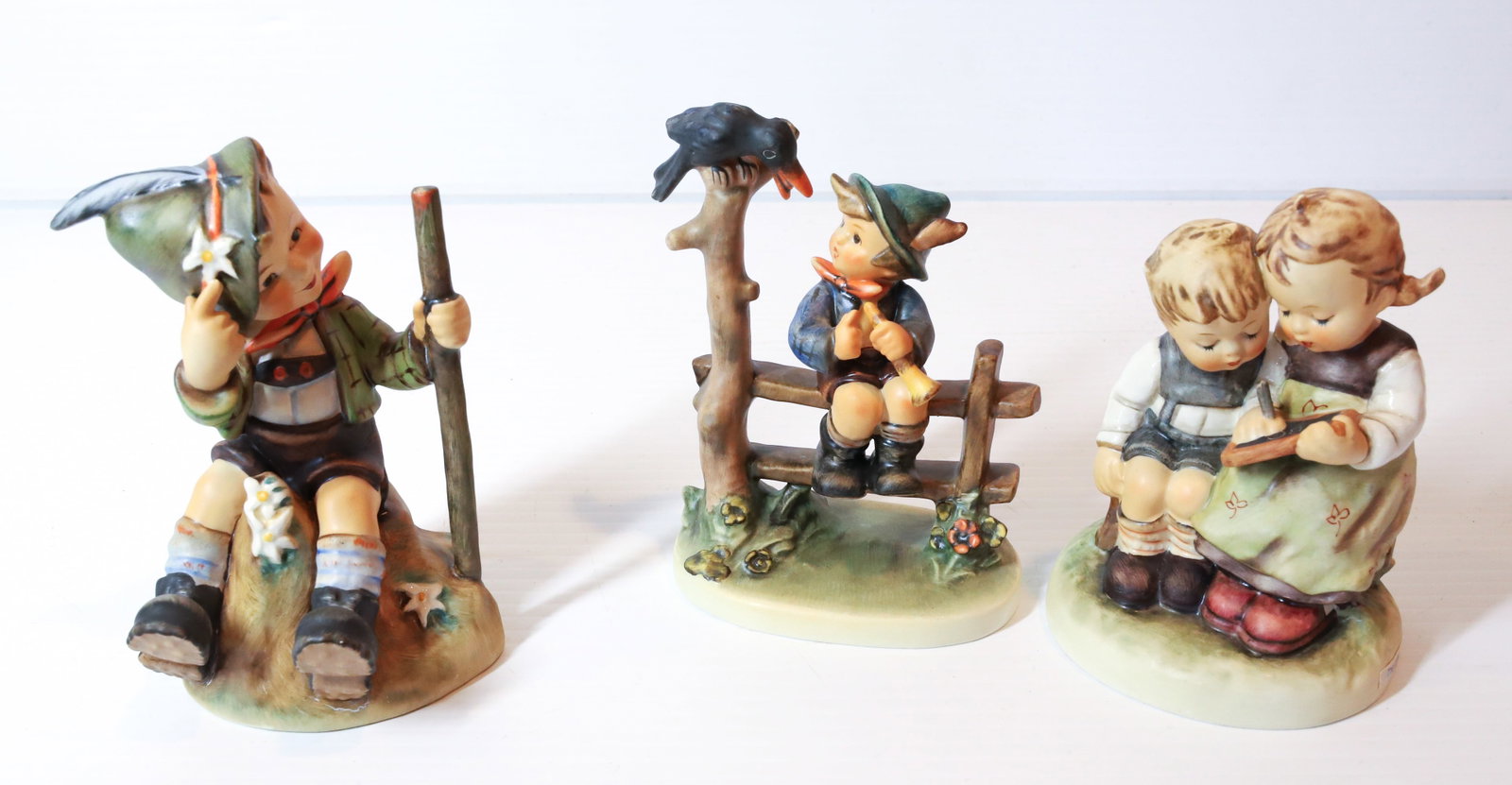 HUMMEL FIGURINES: SMART LITTLE SISTER, MOUNTAINEER 5 1/4 " H, AND MISCHIEF MAKER. TMK-5 MARK PLEASE READ CAREFULLY - Terms for Purchasing and Shipping of Auction Items. Please read carefully before bidding. All payment