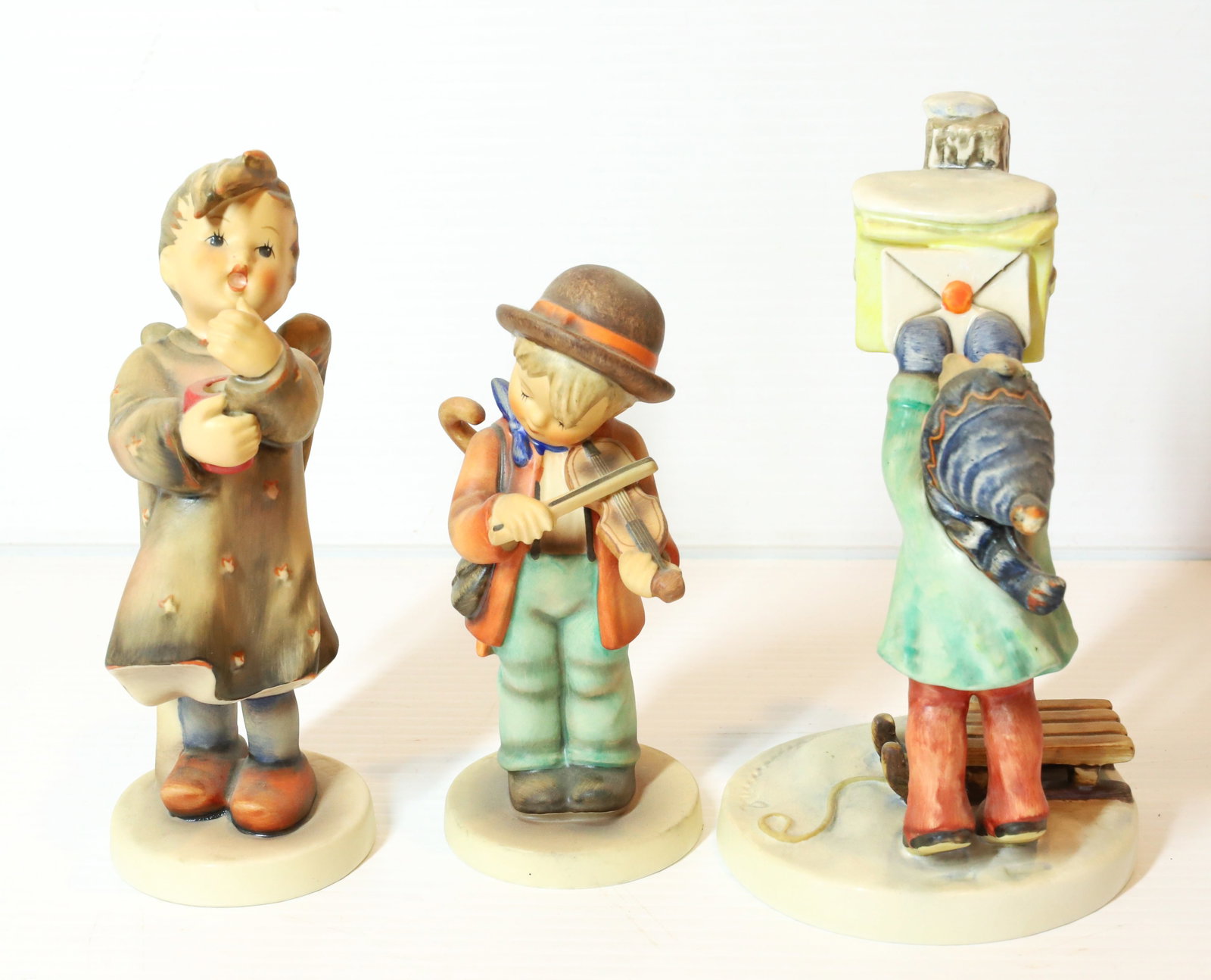 HUMMEL FIGURINES: A LETTER TO SANTA # 340, CANDLELIGHT 7" H AND LITTLE FIDDLER. TMK-5 MARKS PLEASE READ CAREFULLY - Terms for Purchasing and Shipping of Auction Items. Please read carefully before bidding. All payments