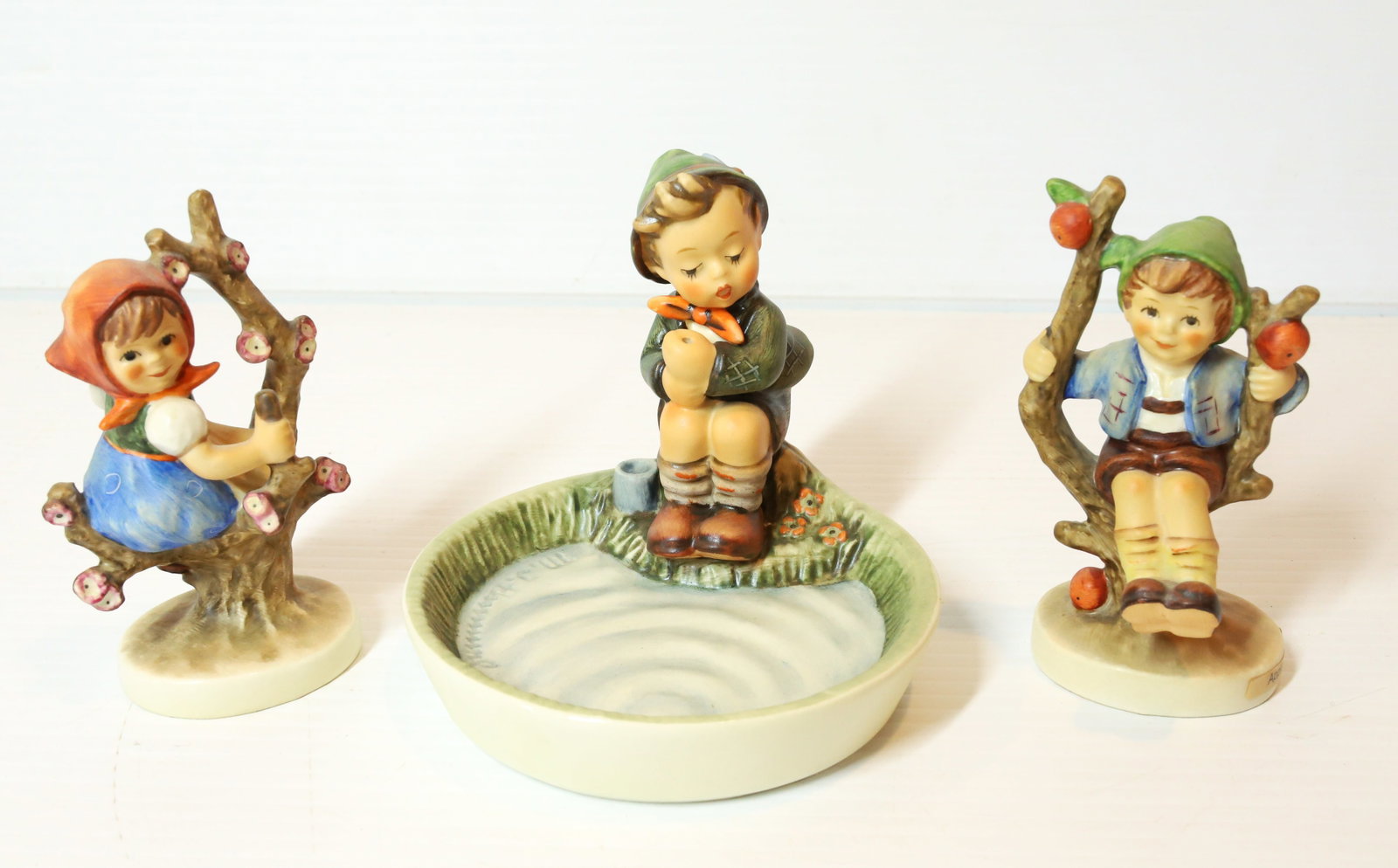 HUMMEL FIGURINES: JUST FISHING 4 1/4" H, APPLE TREE BOY AND GIRL. TMK-6 MARK PLEASE READ CAREFULLY - Terms for Purchasing and Shipping of Auction Items. Please read carefully before bidding. All payments for purchases 