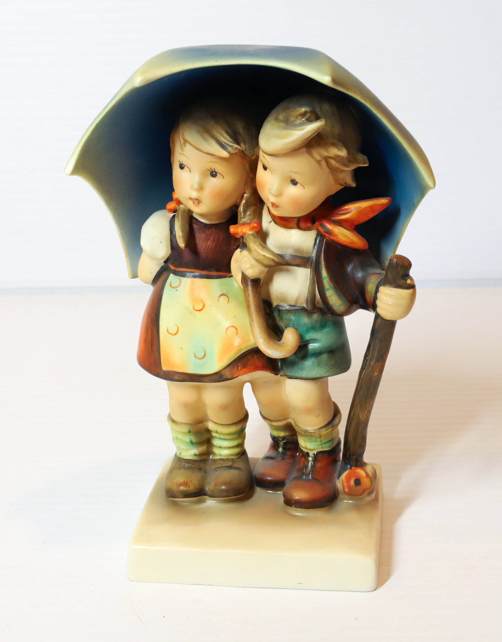 HUMMEL FIGURINE: STORMY WEATHER 71, TMK-2 MARK PLEASE READ CAREFULLY - Terms for Purchasing and Shipping of Auction Items. Please read carefully before bidding. All payments for purchases will be made through LiveAuct