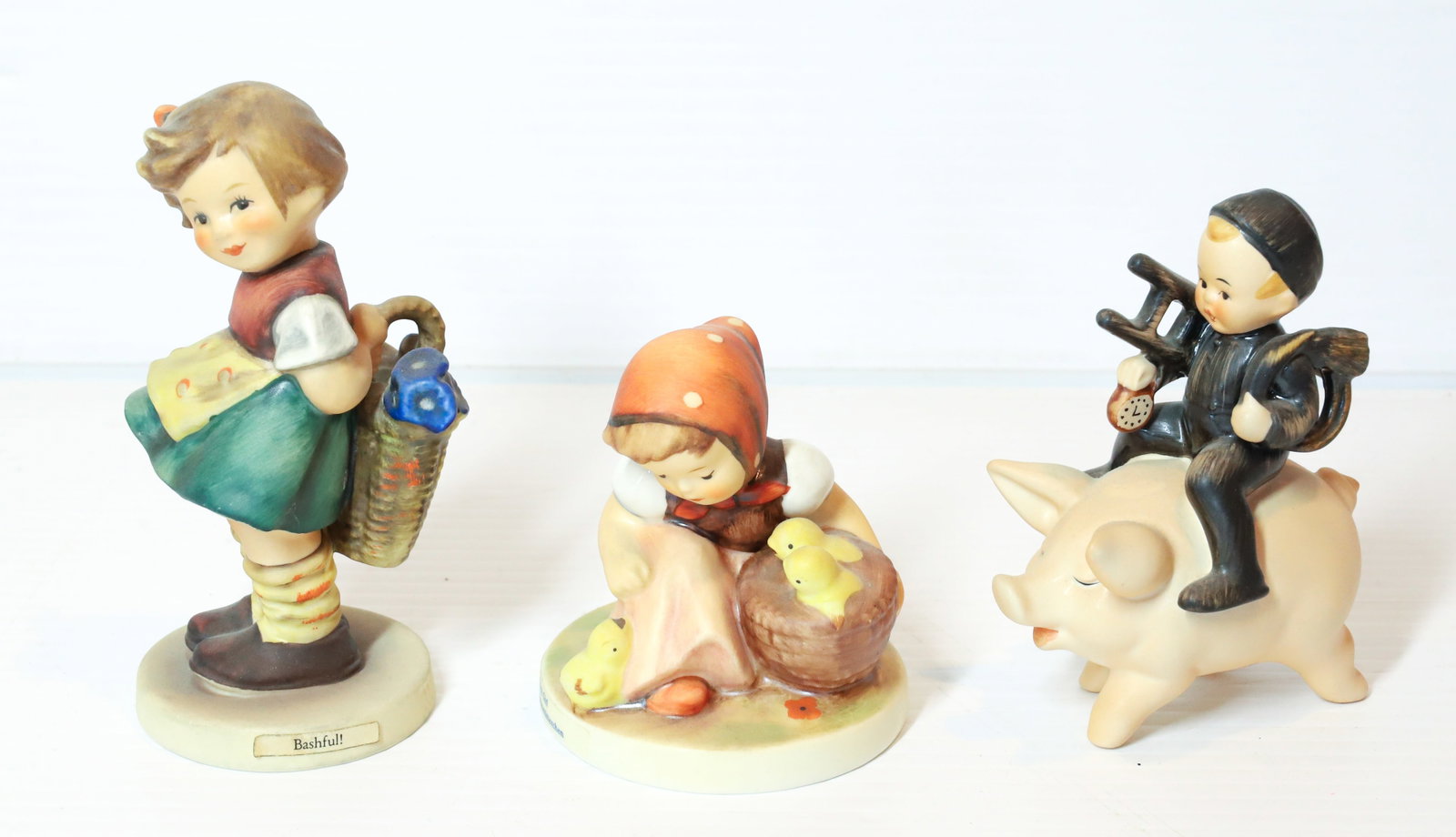 HUMMEL FIGURINES: BASHFUL 4 1/2 ", CHICK GIRL AND CHIMNEY SWEEP. TMK-5 MARKS PLEASE READ CAREFULLY - Terms for Purchasing and Shipping of Auction Items. Please read carefully before bidding. All payments for purchases 