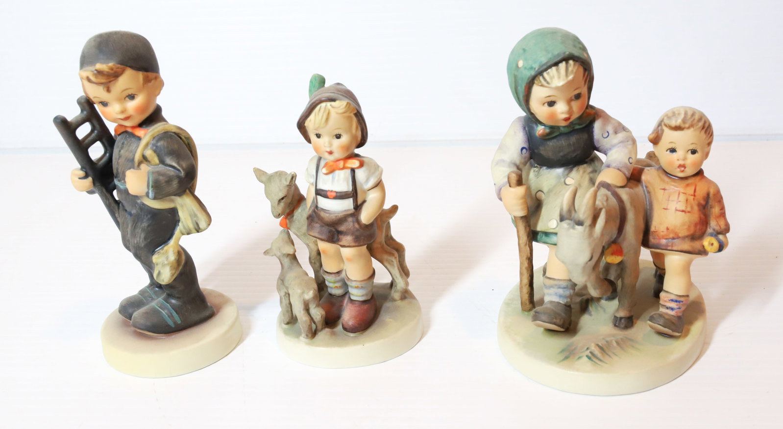 HUMMEL FIGURINES: HOMEWARD BOUND 5 1/4" H, CHIMNEY SWEEP AND LITTLE GOAT. TMK-5 MARK PLEASE READ CAREFULLY - Terms for Purchasing and Shipping of Auction Items. Please read carefully before bidding. All payments for pu