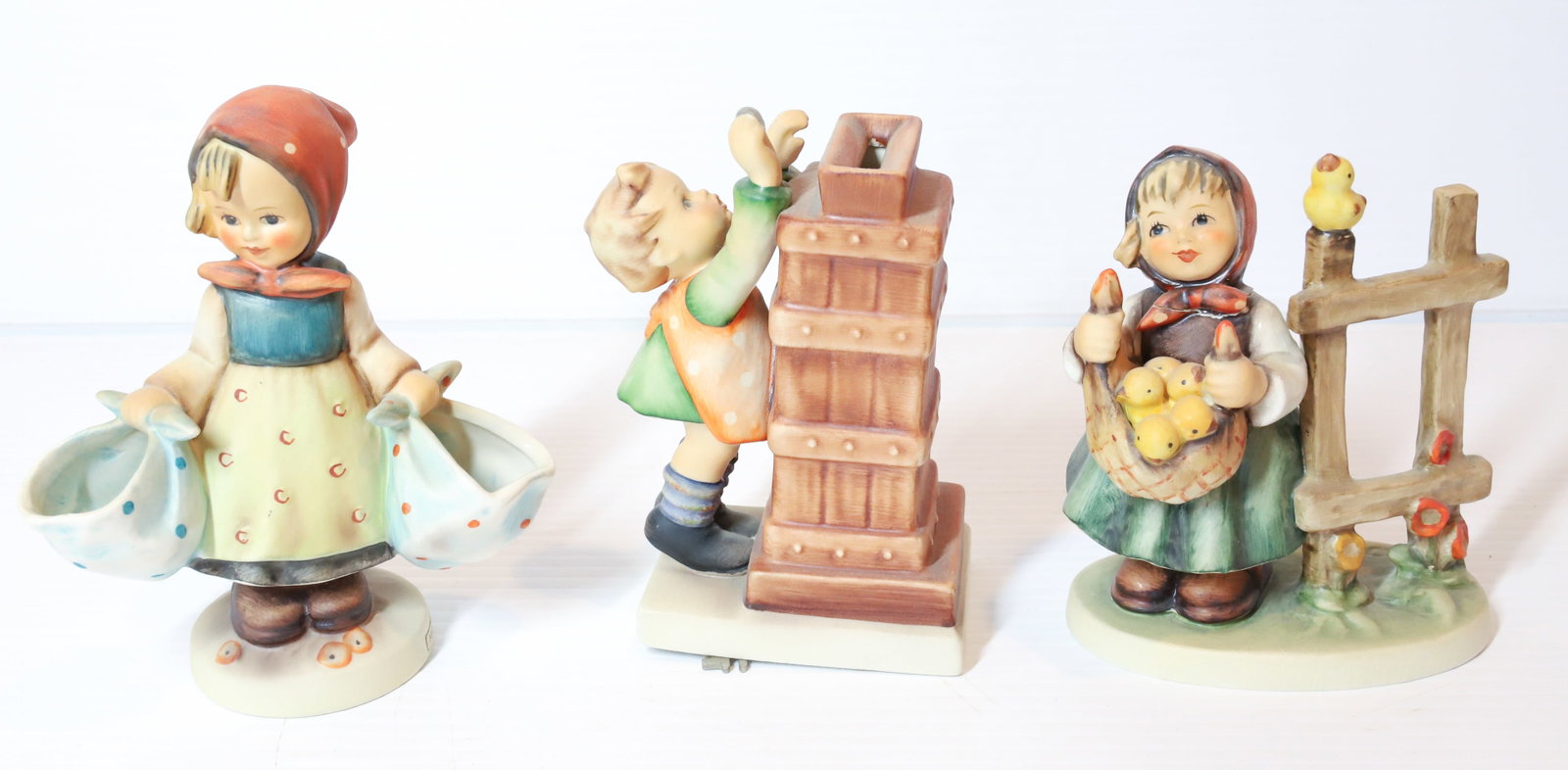 HUMMEL FIGURINES: LITTLE THRIFTY BANK 5 1/4 " H, MOTHER'S DARLING AND CHICKEN LICKEN. TMK-5 MARK PLEASE READ CAREFULLY - Terms for Purchasing and Shipping of Auction Items. Please read carefully before bidding. All pay
