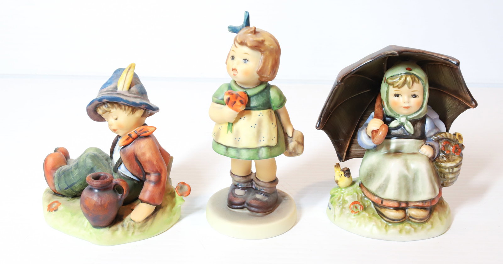 HUMMEL FIGURINES: EXCLUSIVE SPECIAL EDITION, COFFEE BREAK #8 4" H, SMILING THROUGH # 9 AND THE SURPRISE #12. TMK-5 MARKS PLEASE READ CAREFULLY - Terms for Purchasing and Shipping of Auction Items. Please read carefully