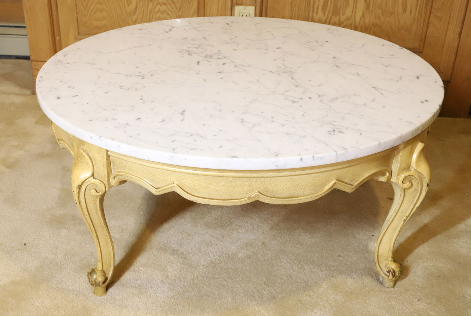 ROUND MARBLE TOP TABLE: FRENCH PROVINCIAL COFFEE TABLE PLEASE READ CAREFULLY - Terms for Purchasing and Shipping of Auction Items. Please read carefully before bidding. All payments for purchases will be made through LiveAuc