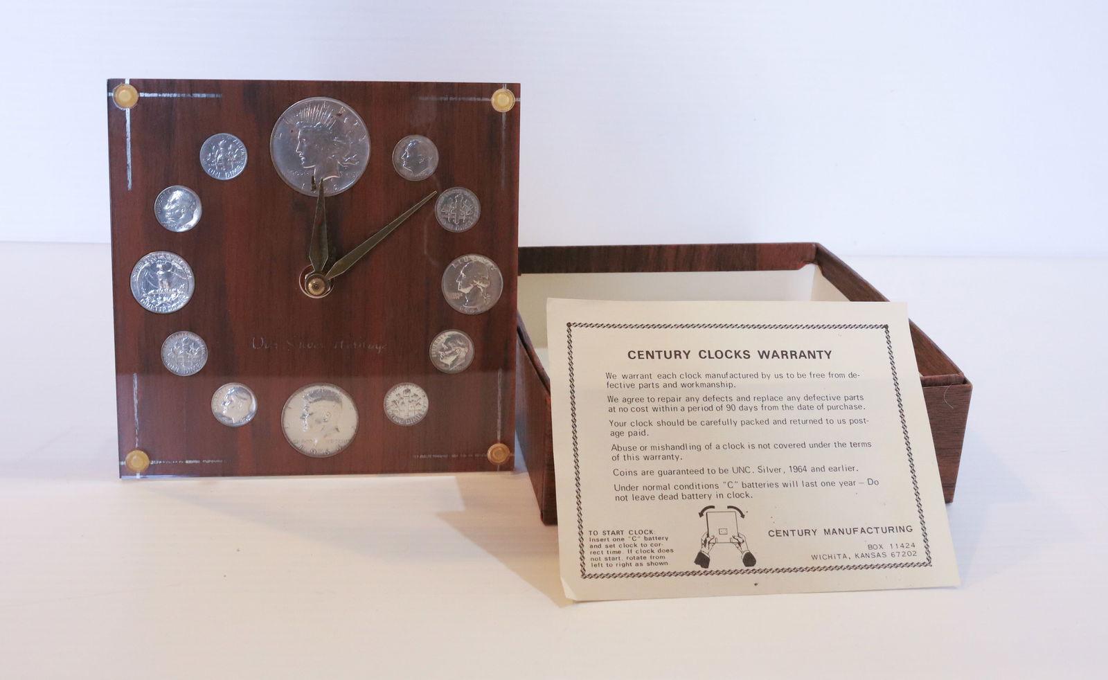 CENTURY COIN CLOCK: COIN CLOCK WITH 1964 UNC COINS PLEASE READ CAREFULLY - Terms for Purchasing and Shipping of Auction Items. Please read carefully before bidding. All payments for purchases will be made through LiveAuc