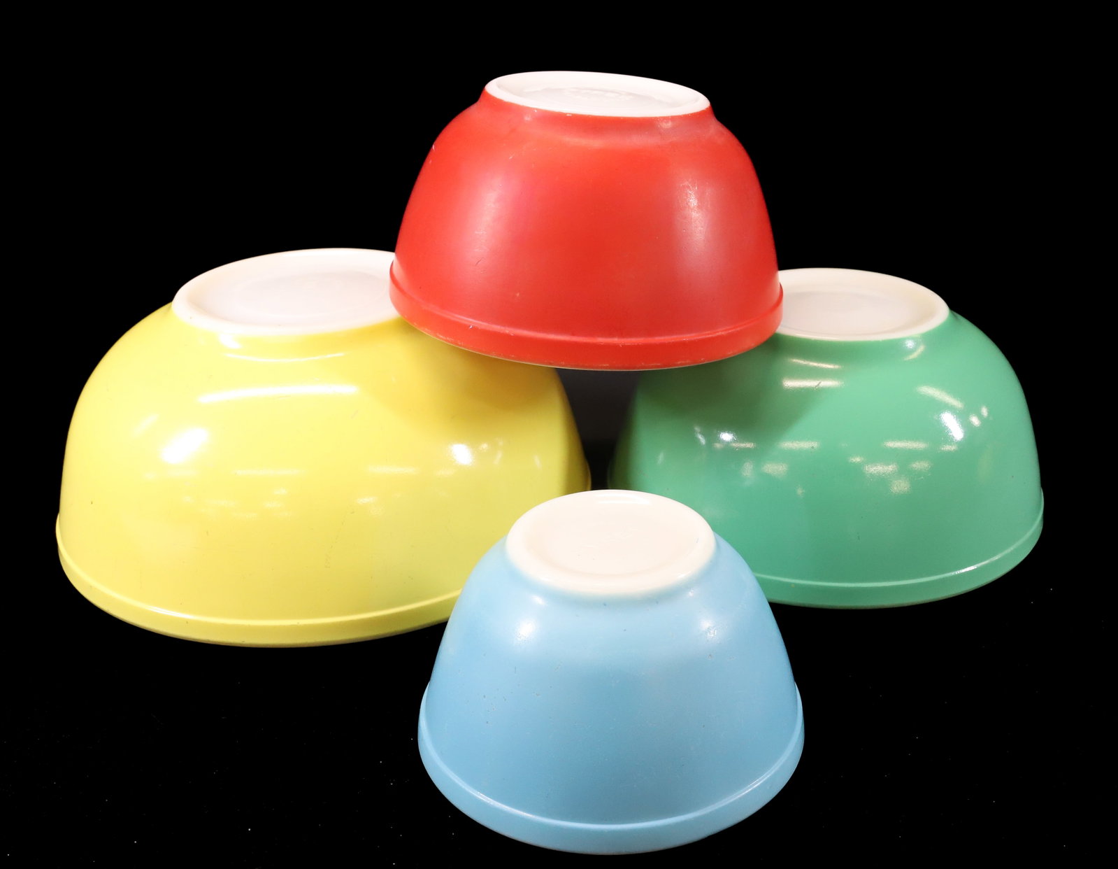 NEST OF PYREX MIXING BOWLS: 5 3/4" TO 10 1/4" D. PLEASE READ CAREFULLY - Terms for Purchasing and Shipping of Auction Items. Please read carefully before bidding. All payments for purchases will be made through LiveAuctioneers.c