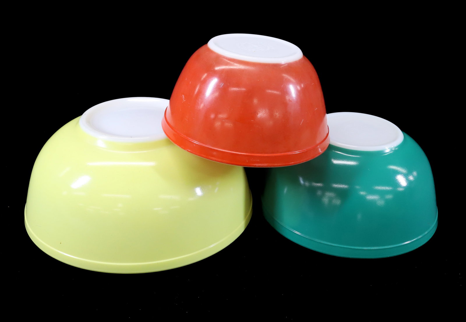 NEST OF (3) PYREX MIXING BOWLS: 7 1/4" TO 10 1/4" D. PLEASE READ CAREFULLY - Terms for Purchasing and Shipping of Auction Items. Please read carefully before bidding. All payments for purchases will be made through LiveAuctioneers.c