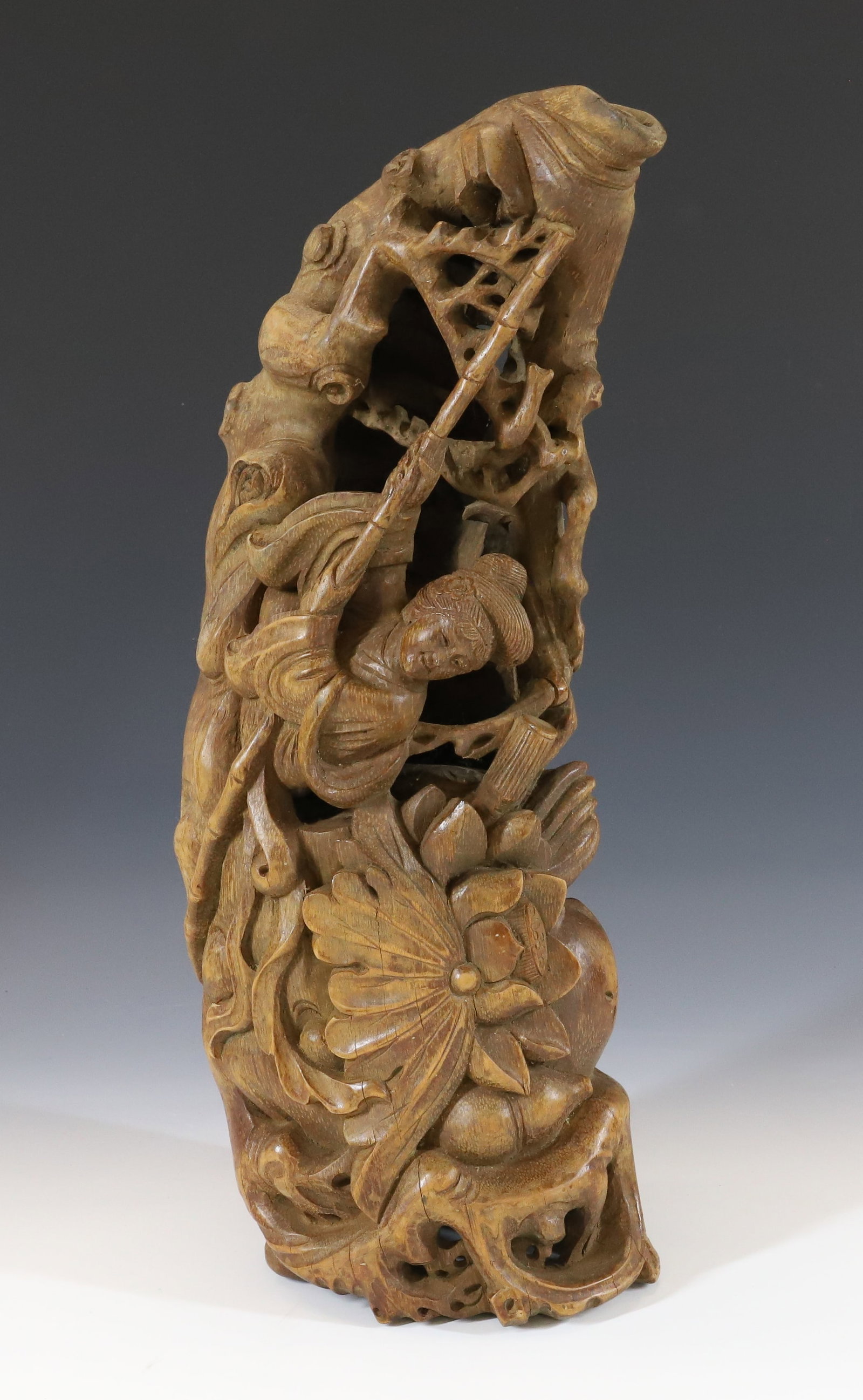 CHINESE CARVED WOOD SCULPTURE: PERSON WITH BAMBOO STICK IN BOAT WITH CARVED FLOWERS, BRANCHES, SEA WAVES 9 1/2" X 14 1/2" X 4" PLEASE READ CAREFULLY - Terms for Purchasing and Shipping of Auction Items. Please read carefully before