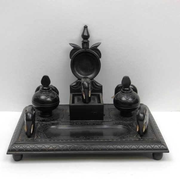 Ebony Ink Stand: 7 5/8" x 10 3/8" x 7 1/2" includes pocket watch holder. All hand carved from ebony. 4 elephant figures