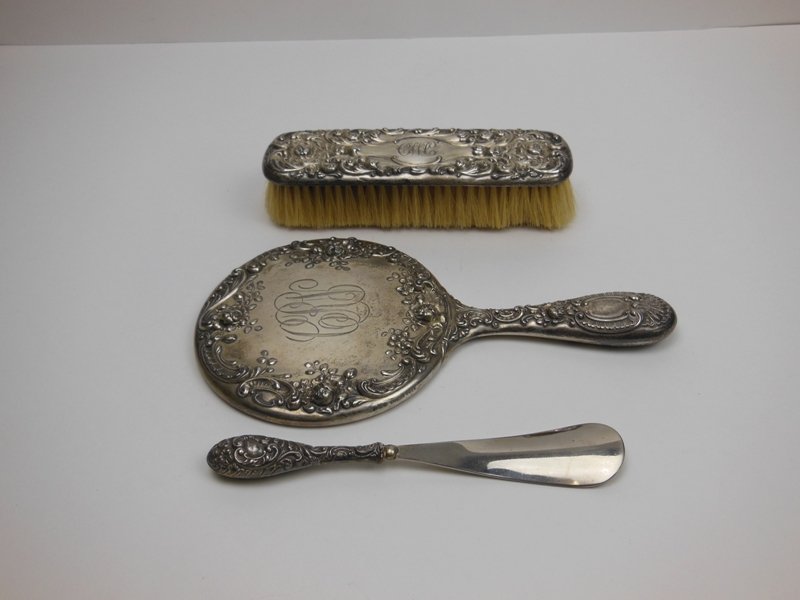 Sterling Gorham Hand Mirror "Vining Rose" Pattern,: Gorham mirror heavy gauge silver "Vining Roses" ornate pattern. Brush marked sterling. Large dent on monogram (Not Gorham). Shoehorn has sterling handle.